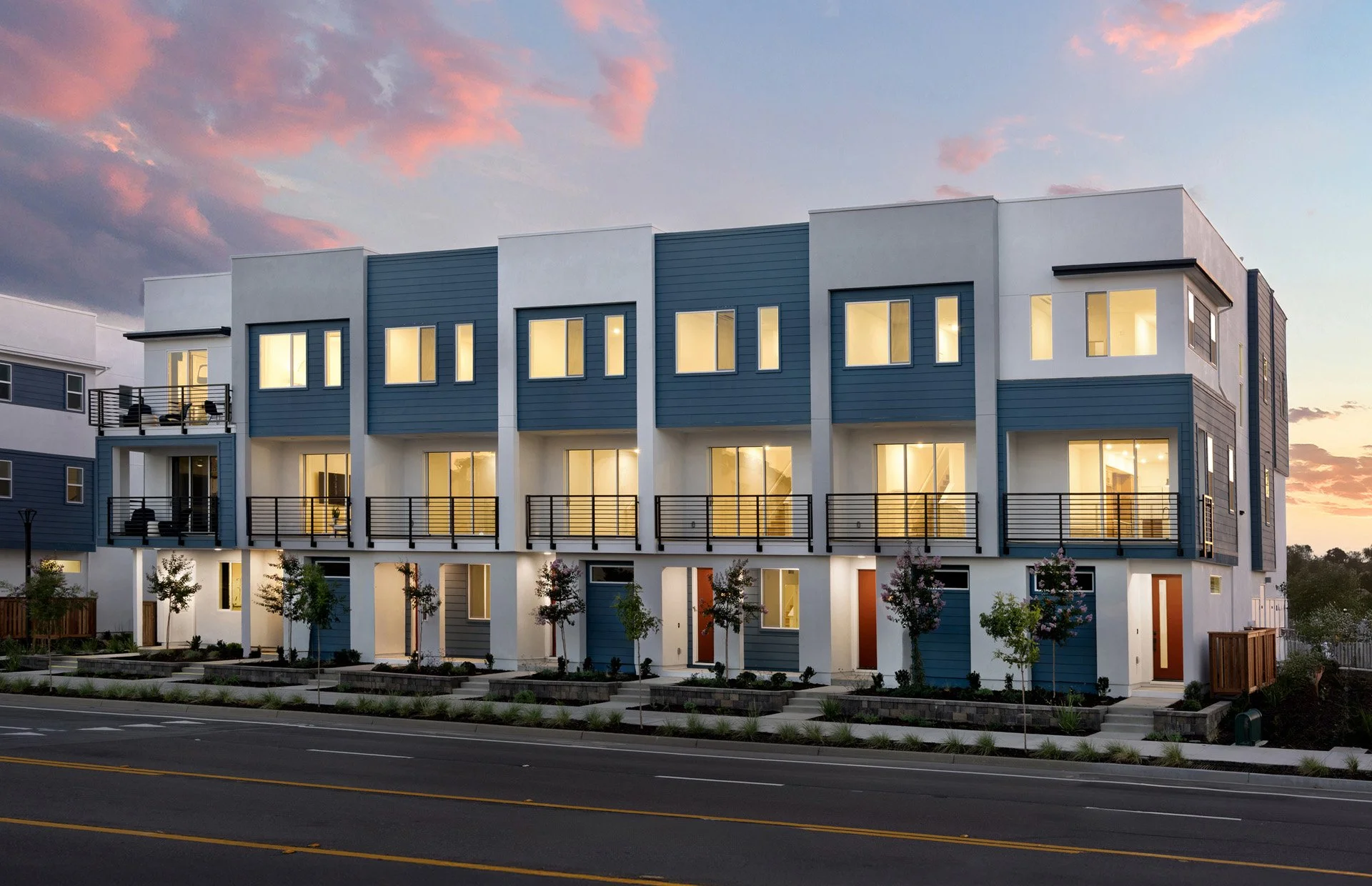 Pulte_ApexAtTheDistrict_1StreetScene-Twilight_1212d-1920x1240.jpg