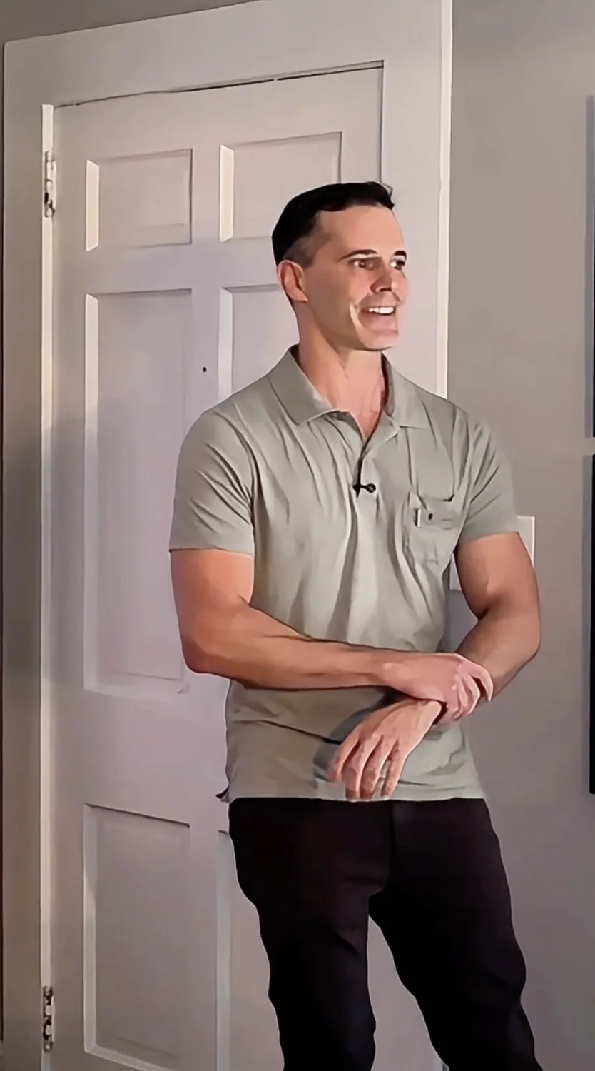 A man standing in front of a door
