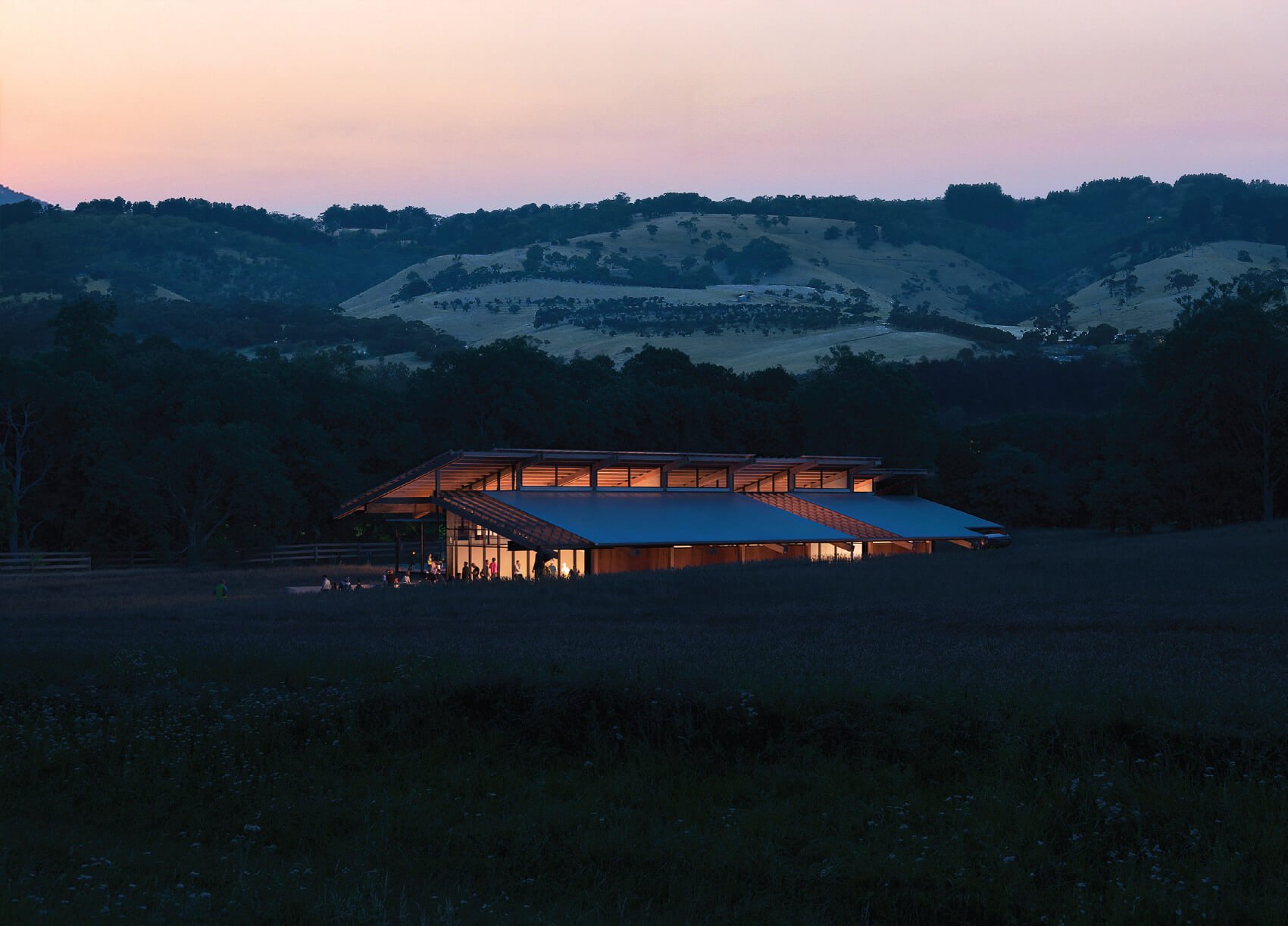 SoCal Rancho beneath its broad articulated roof in the Southern California landscape