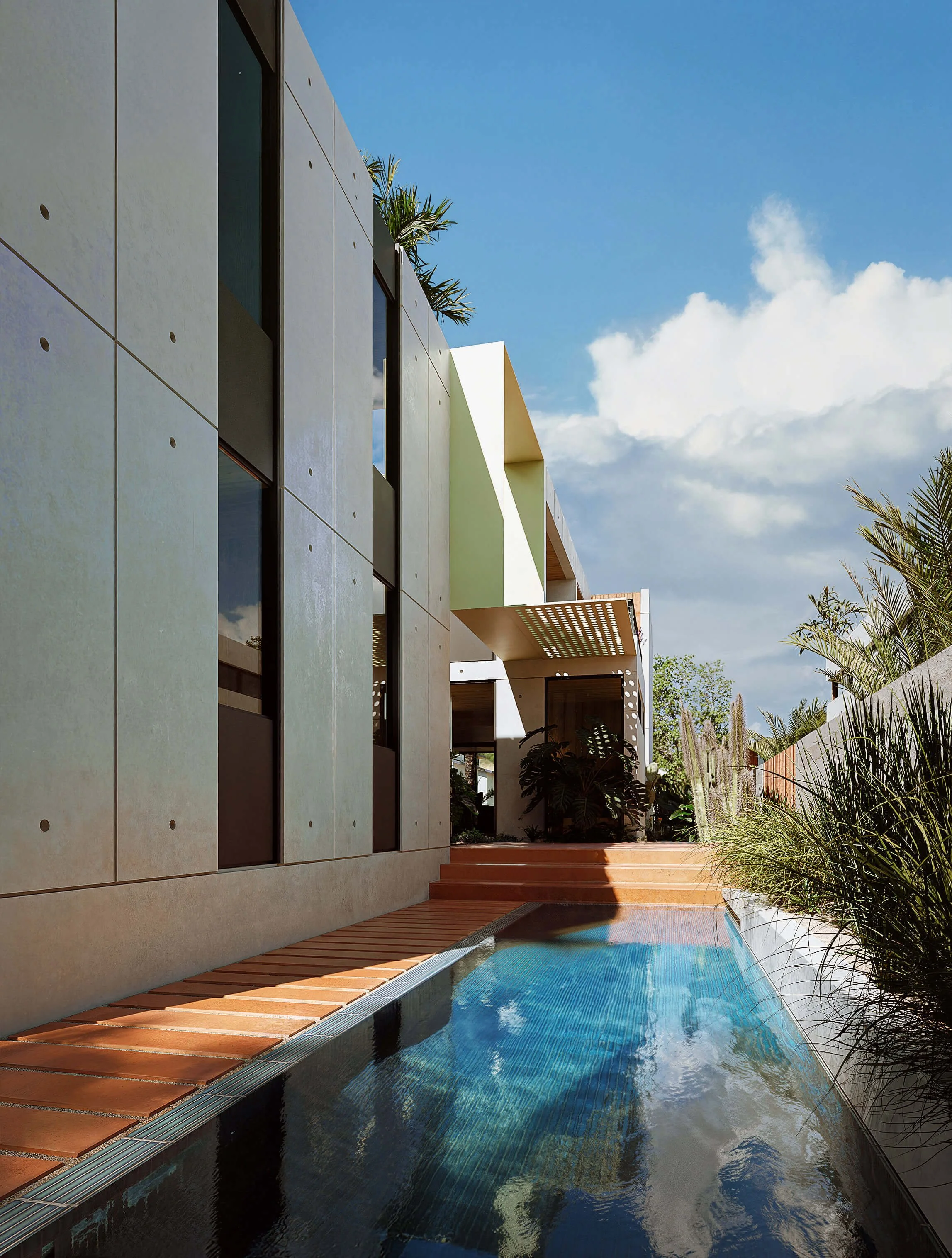 Linear pool and courtyard running alongside Dappled House beneath a perforated shade canopy