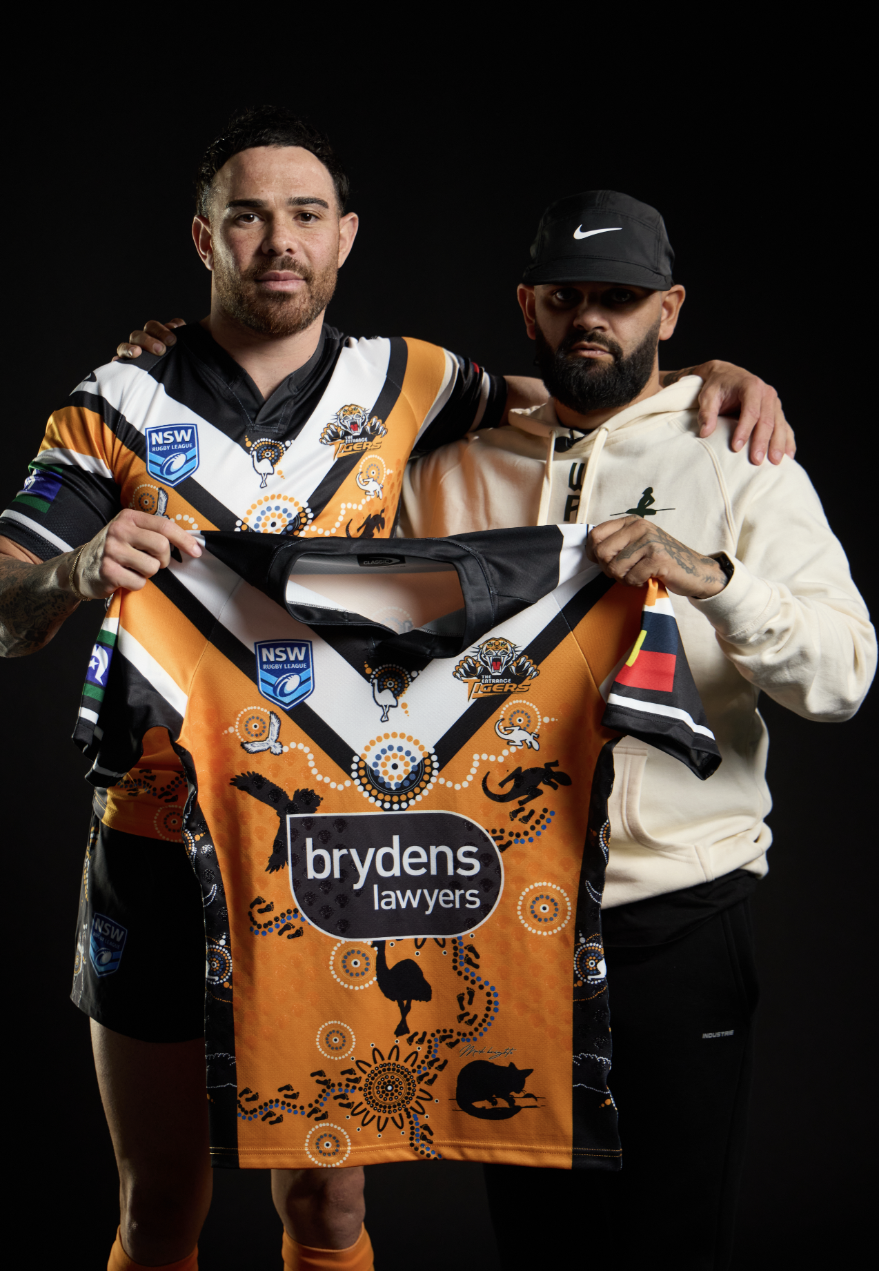 Branded sports content featuring two men with a rugby jersey, photographed by G Studios
