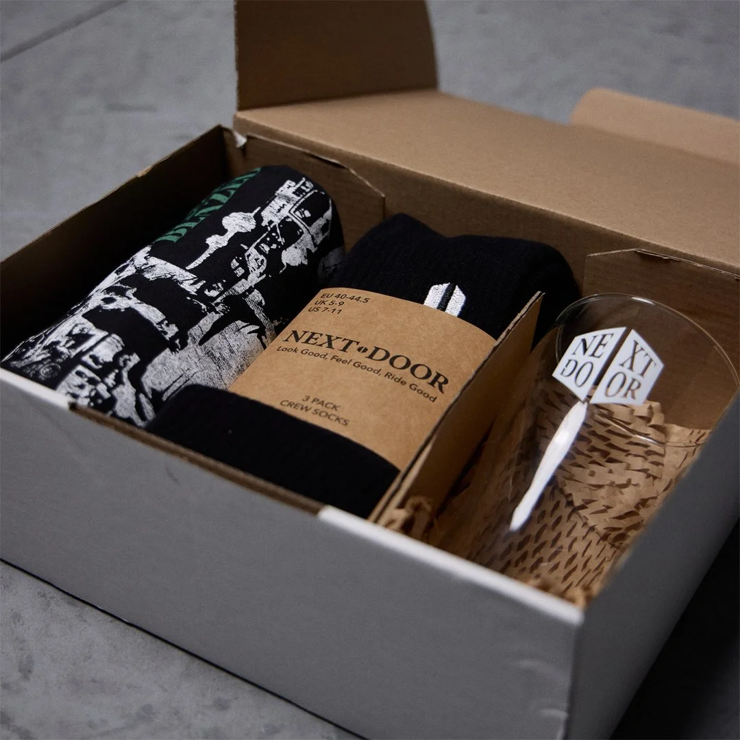 Next Door branded gift box and apparel photographed by G Studios for commercial product content