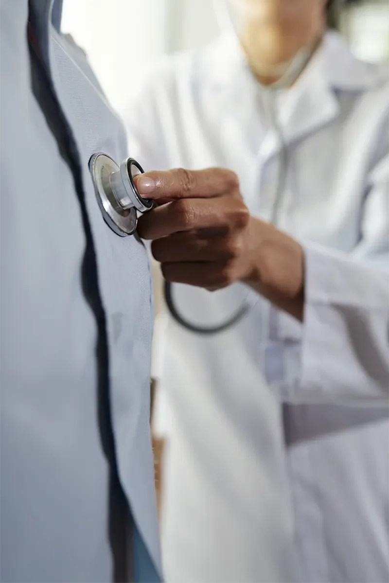 Provider holding a stethoscope