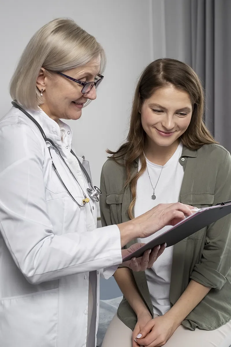 Provider reviewing results with a smiling patient
