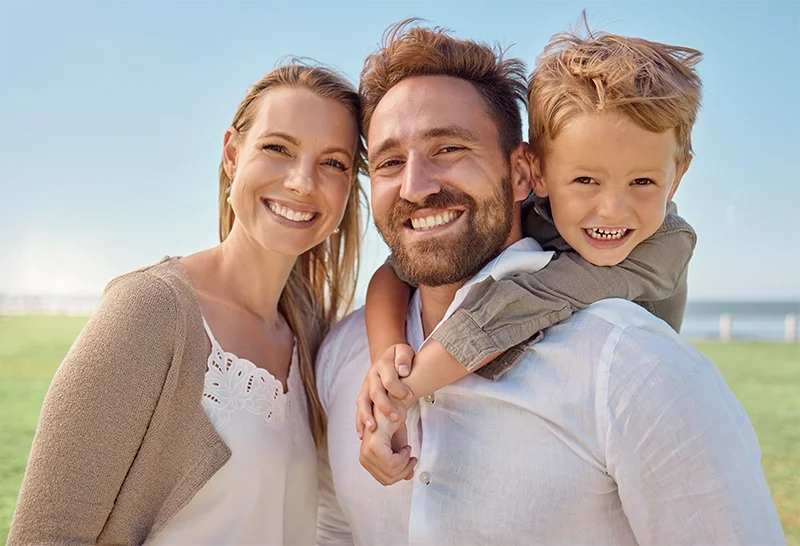 Family smiling together outside Redding family clinic Integrity Medical Center walk in clinic