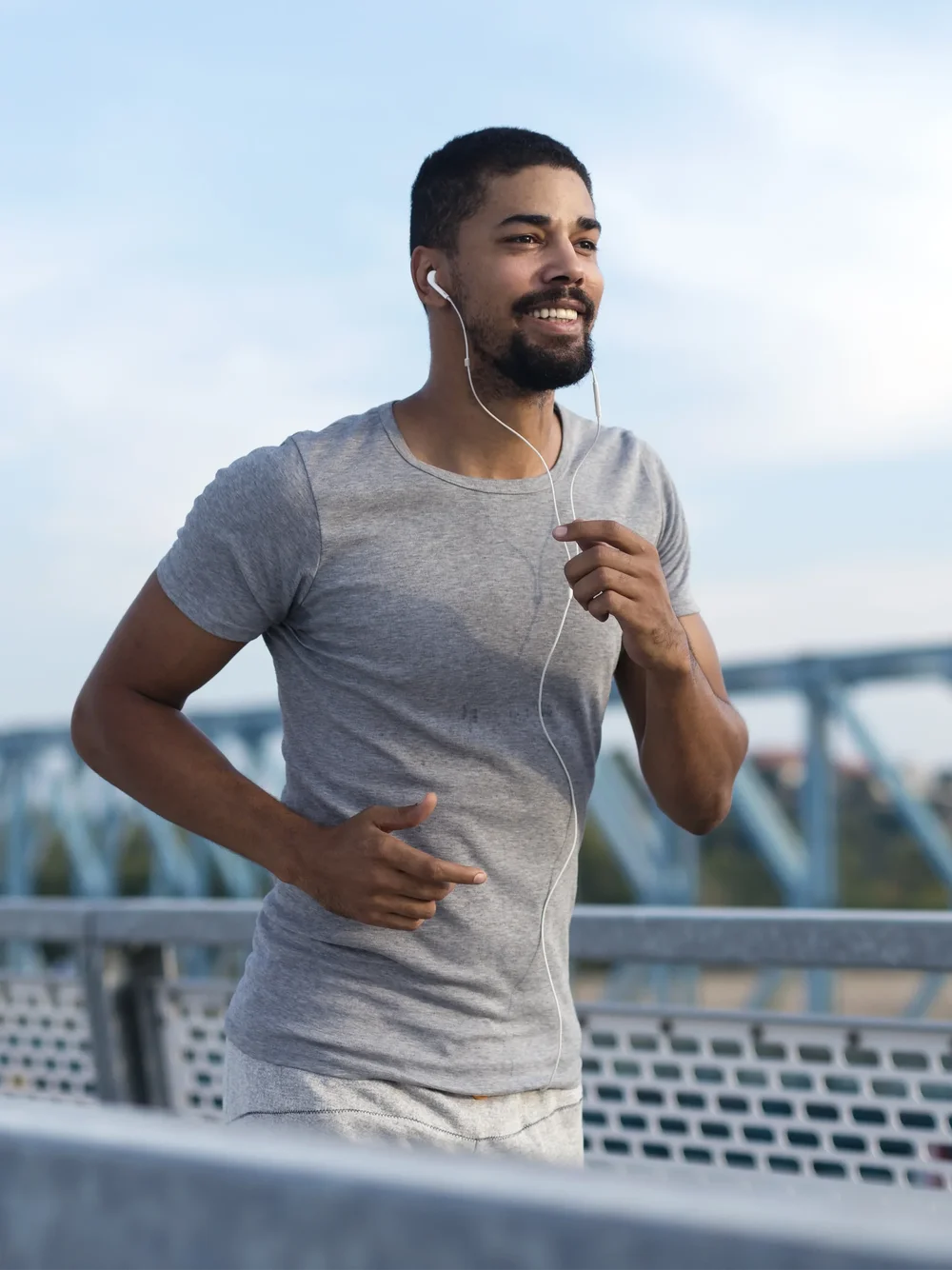 Man smiling during an outdoor run
