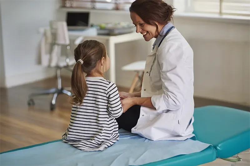 Nurse practitioner examining pediatric patient during same week sick visit in Redding, CA at Integrity Medical Center