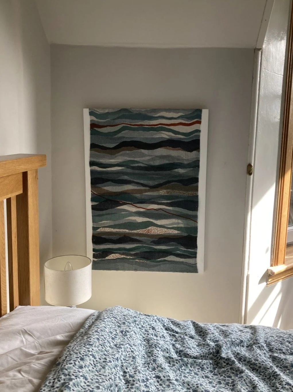 Print pinned on board and mounted in customers home