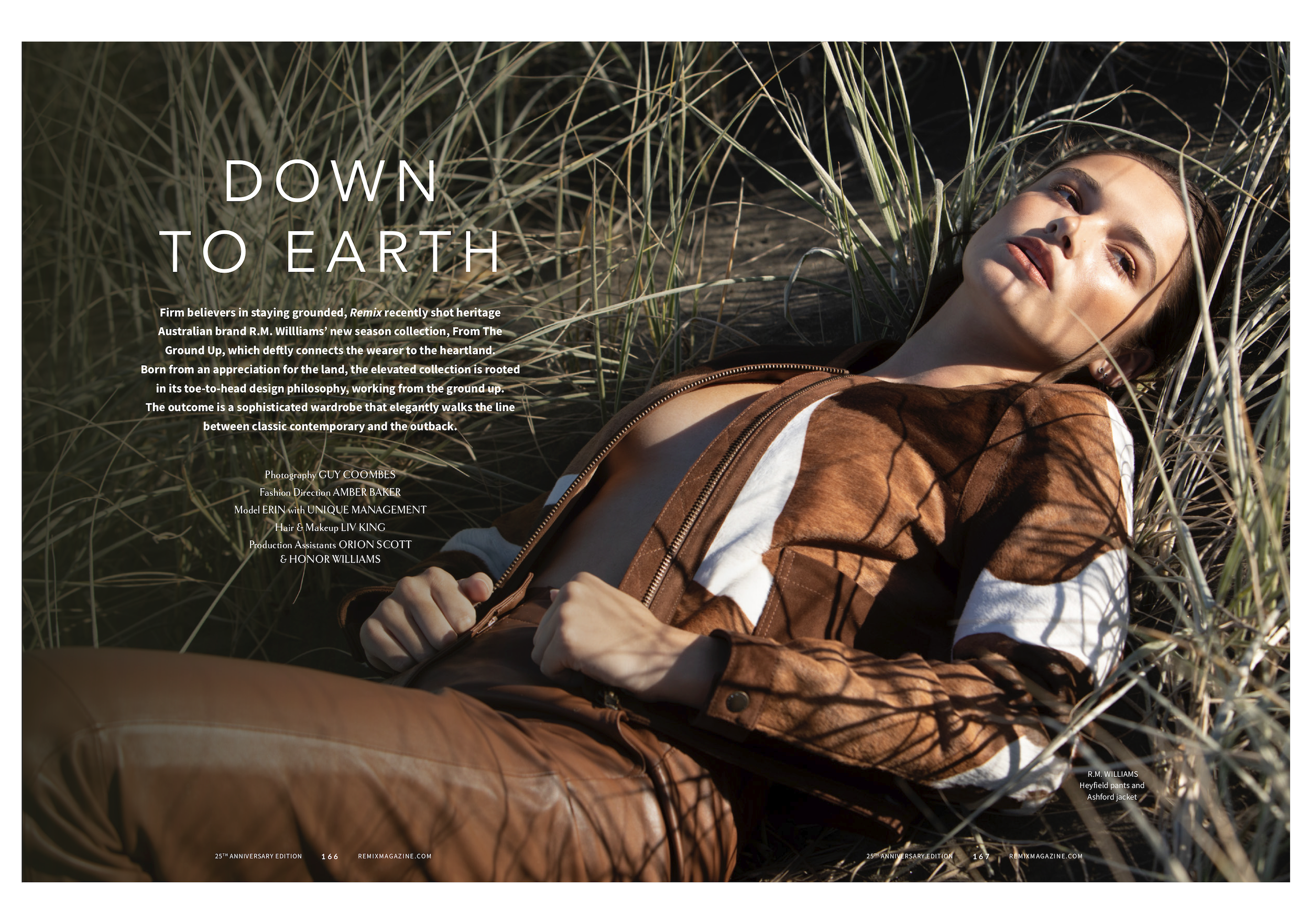 A woman lying in grass with her eyes closed, wearing a brown and white jacket and brown pants.