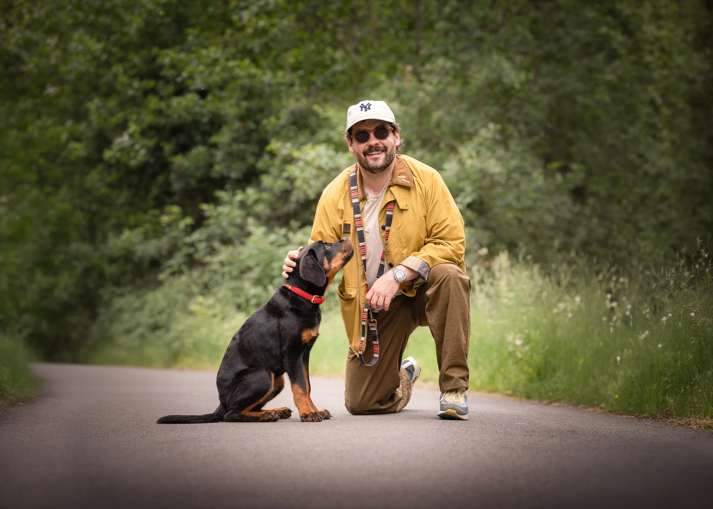 Comedian Adam Rowe with his Rottweiler puppy