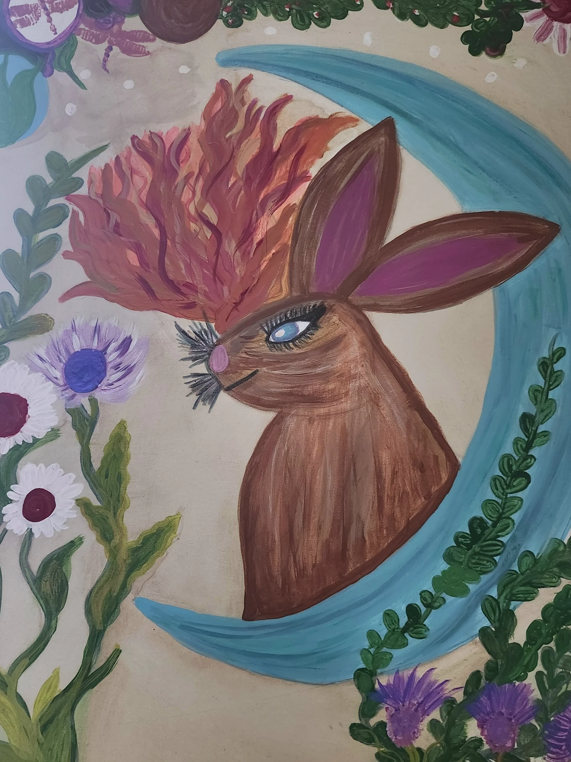 A colorful illustration of a fox with fairytale-like makeup, surrounded by flowers, leaves, and a flowing blue ribbon or water element.
