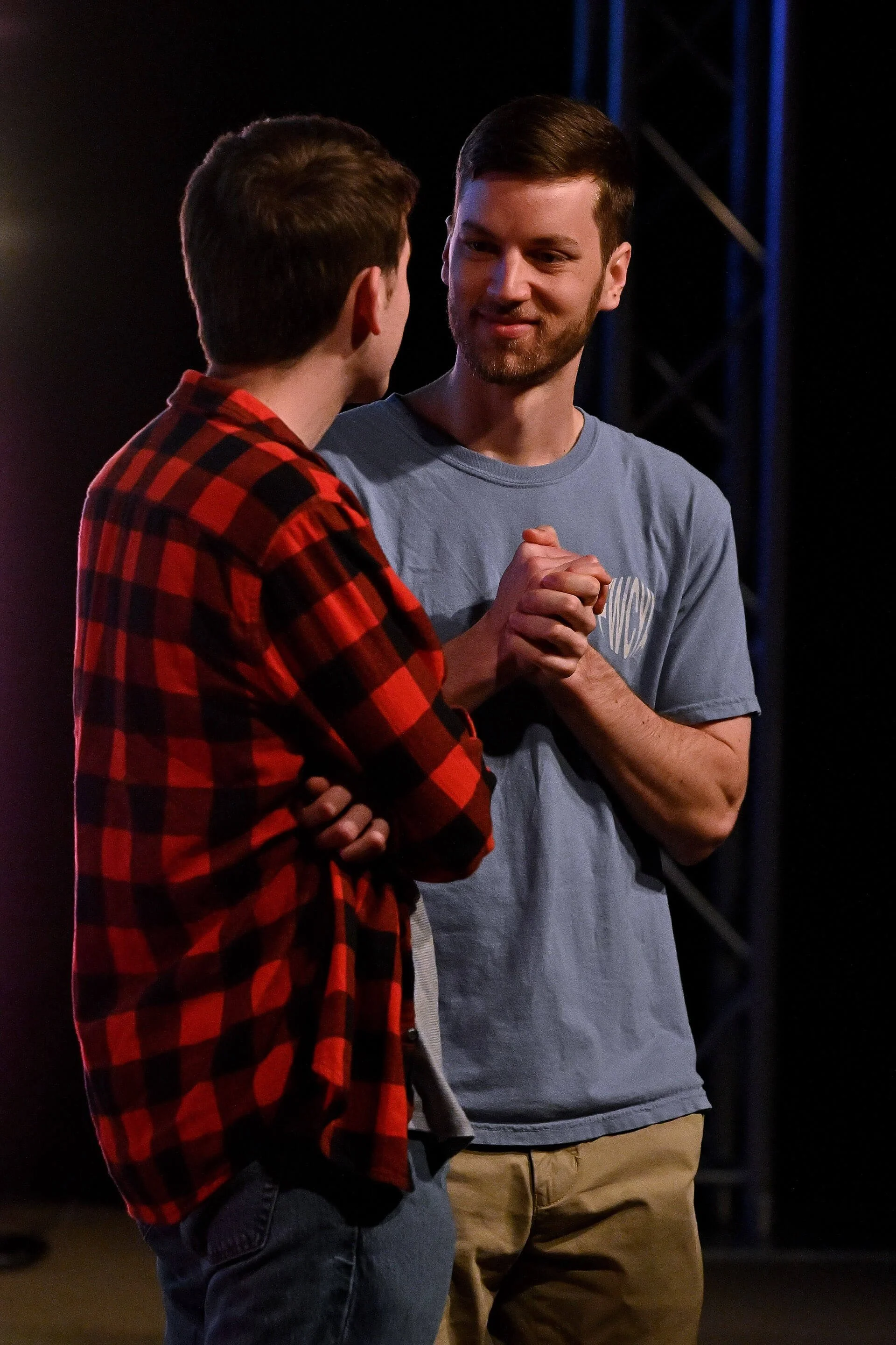 Two men passionately talking.