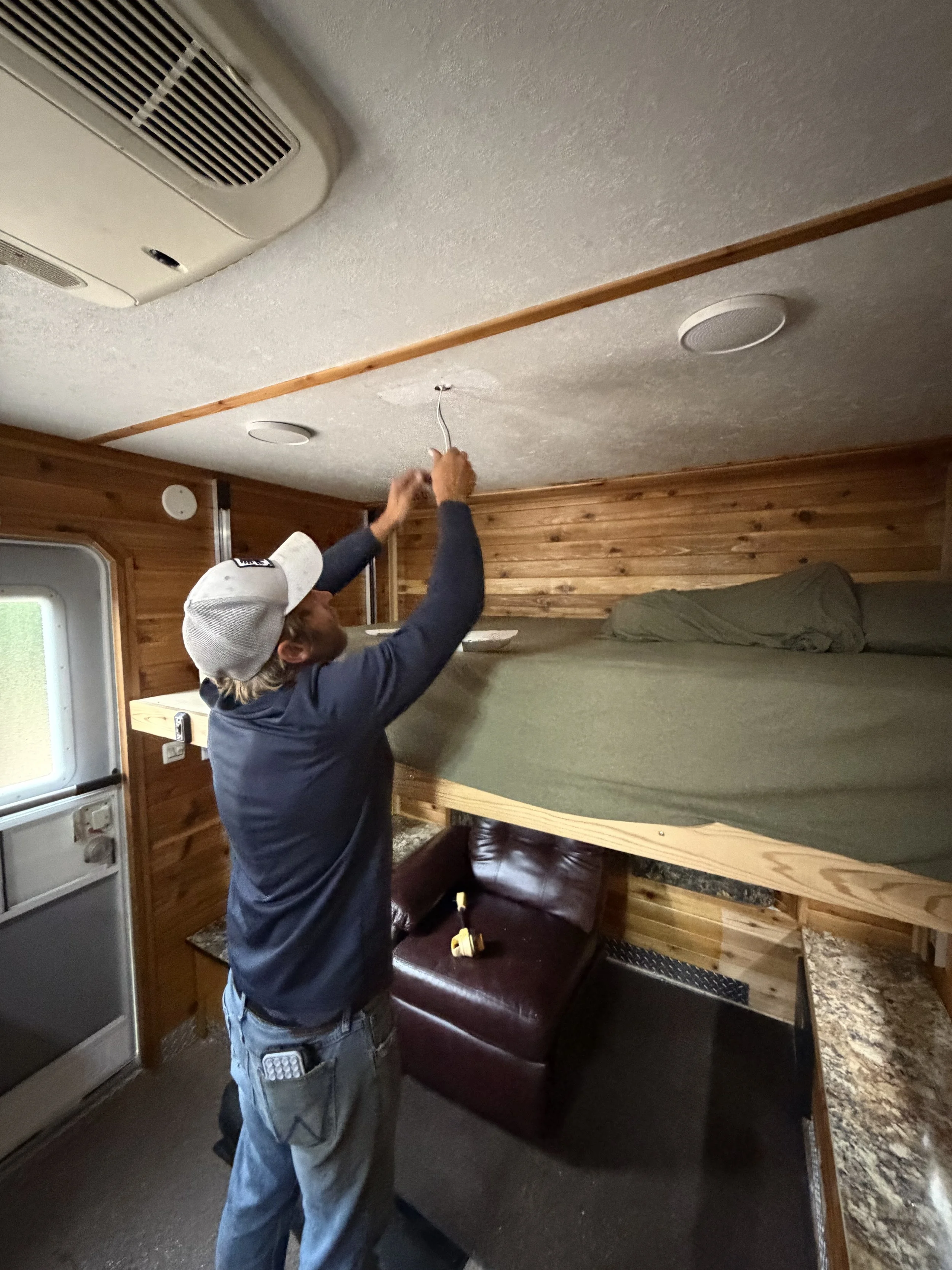 North Country Outdoors technician completing fish house service work