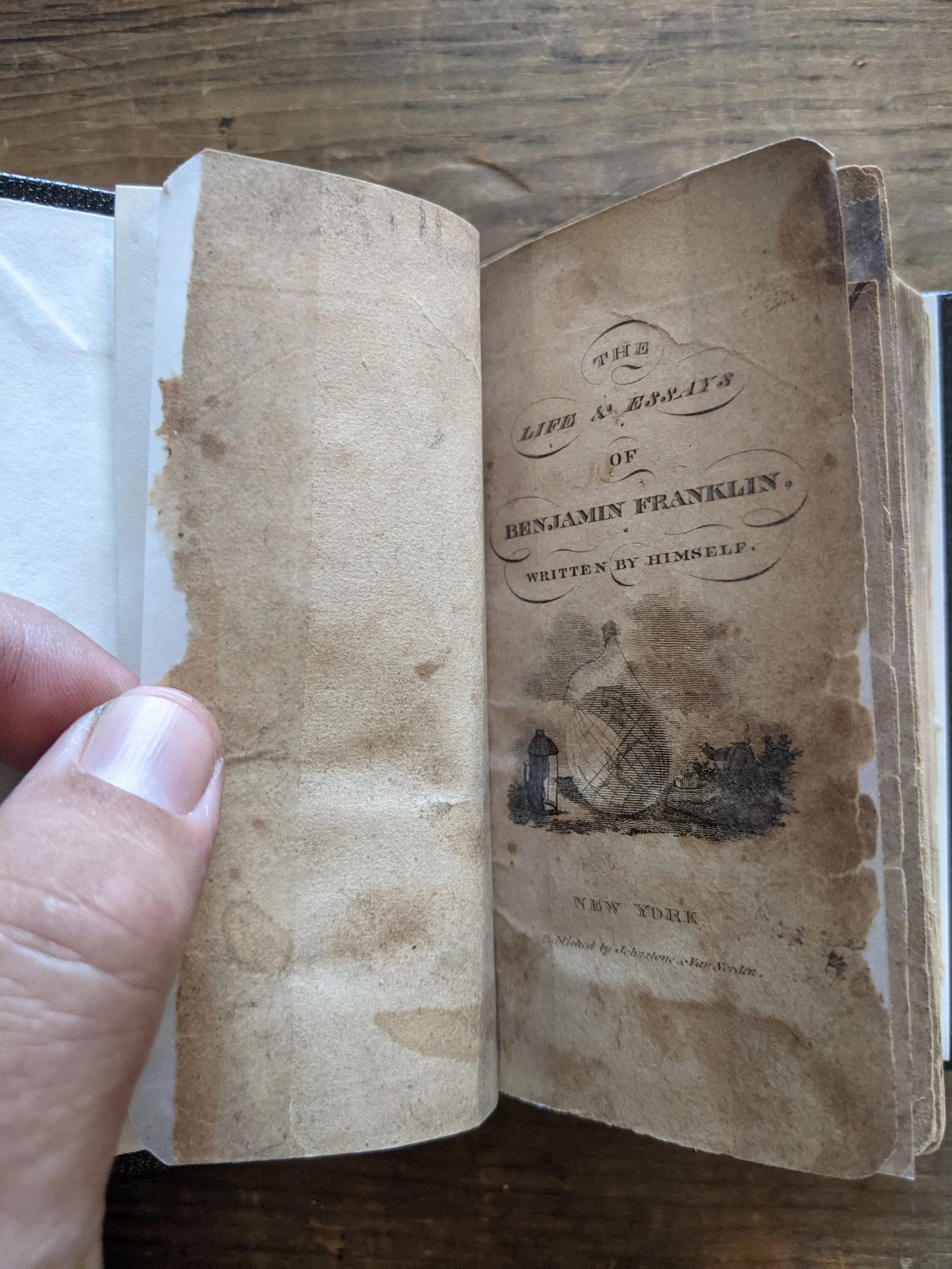 Autobiography of Benjamin Franklin, librarian’s thumb for scale