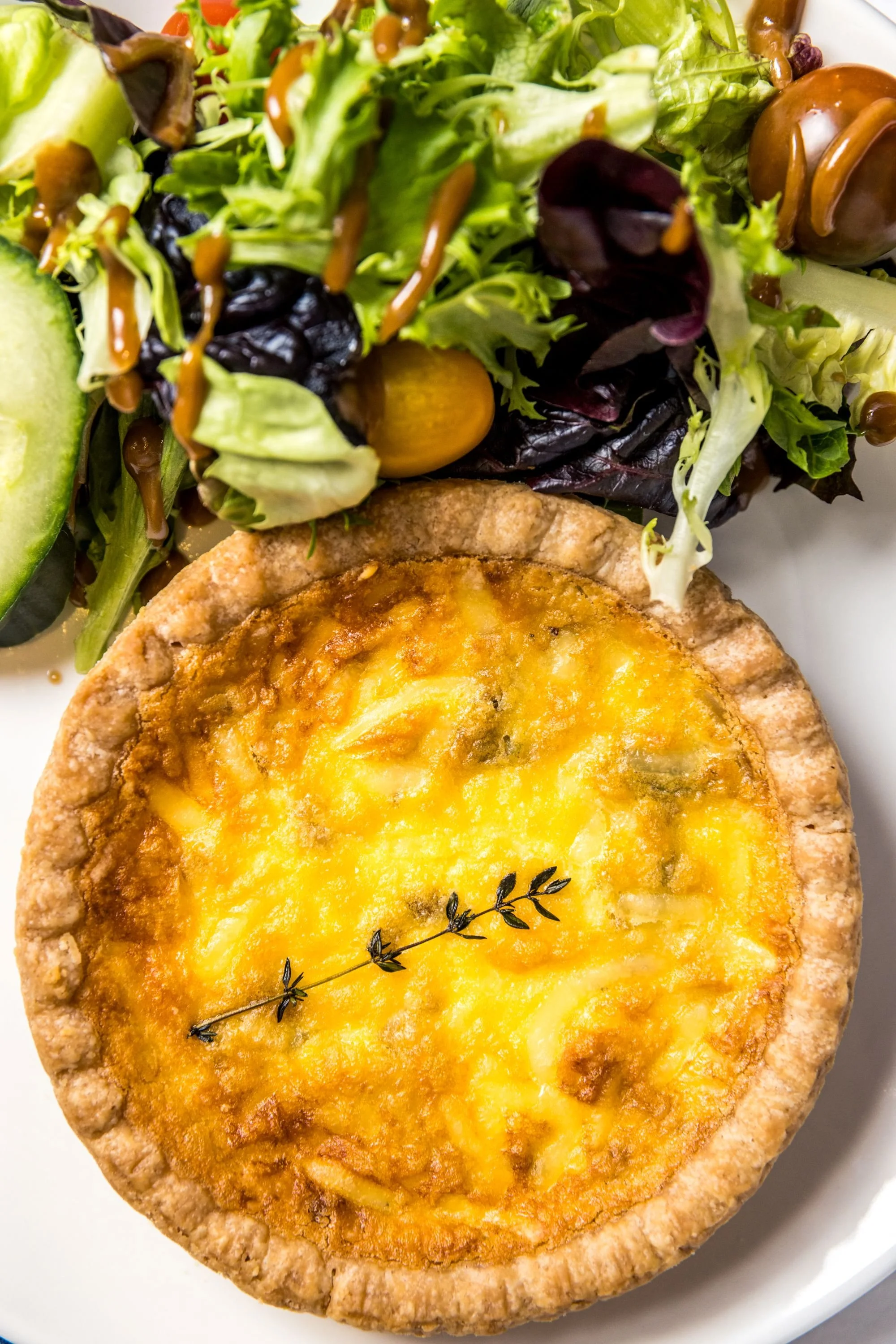  Quiche, $15  Quiche Lorraine or quiche du jour, served with chips, cup of soup, or side salad 