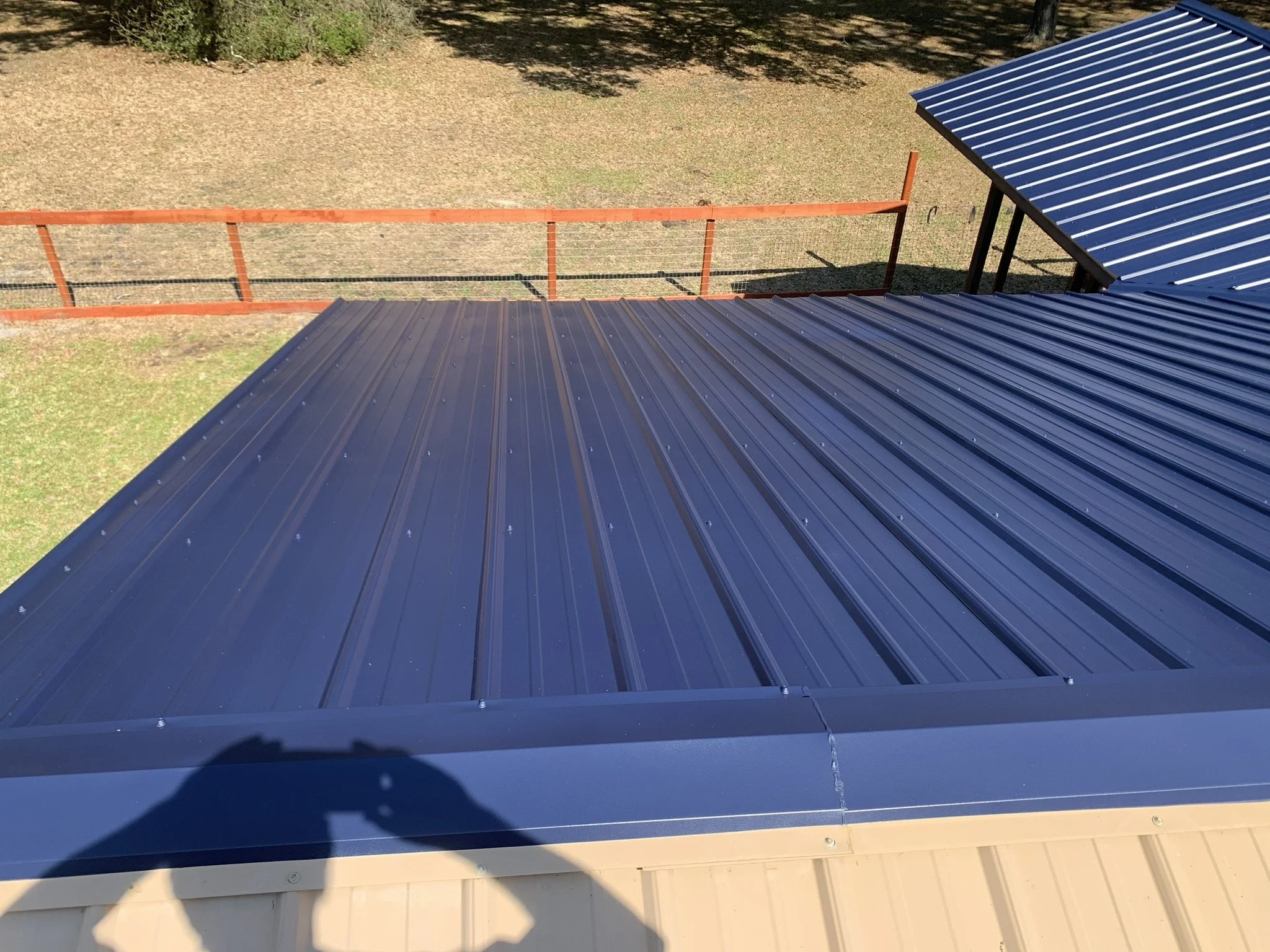 Completed protective metal roof coating and exterior maintenance project by HavenForged in Sarasota, FL