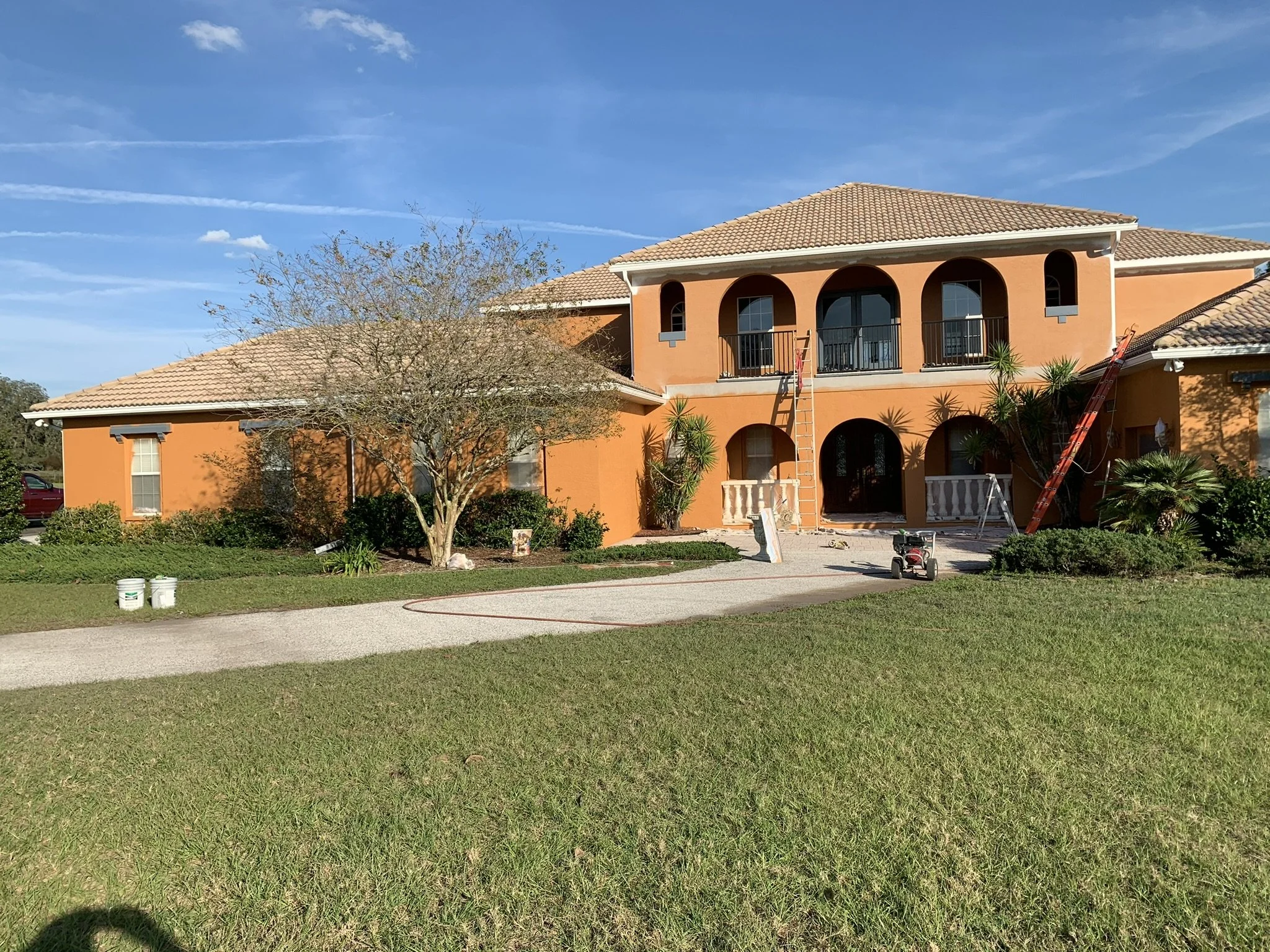 Completed exterior painting project on a large Florida home by HavenForged in Sarasota, FL.