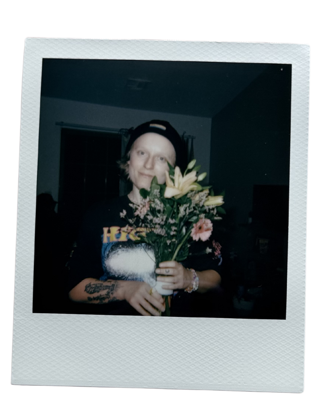 the night before the wedding we bought a bunch of flowers from a grocery store, and we put together these beautiful arrangements