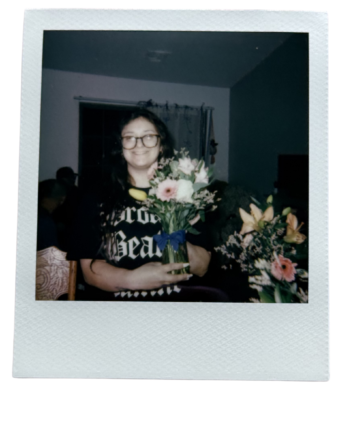 the night before the wedding we bought a bunch of flowers from a grocery store, and we put together these beautiful arrangements