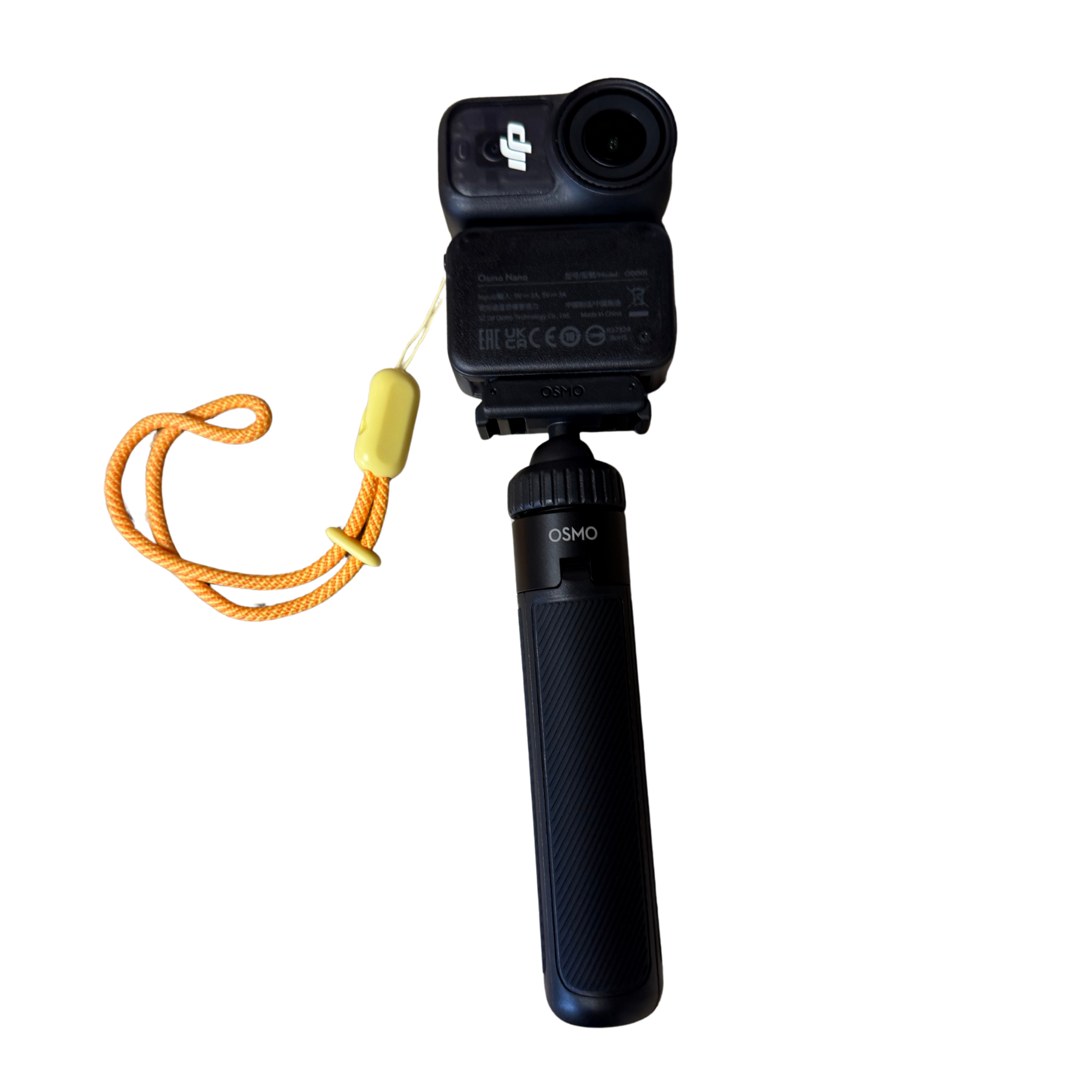 A helmet camera mounted on a black tripod, with a yellow lanyard attached, against a black background.