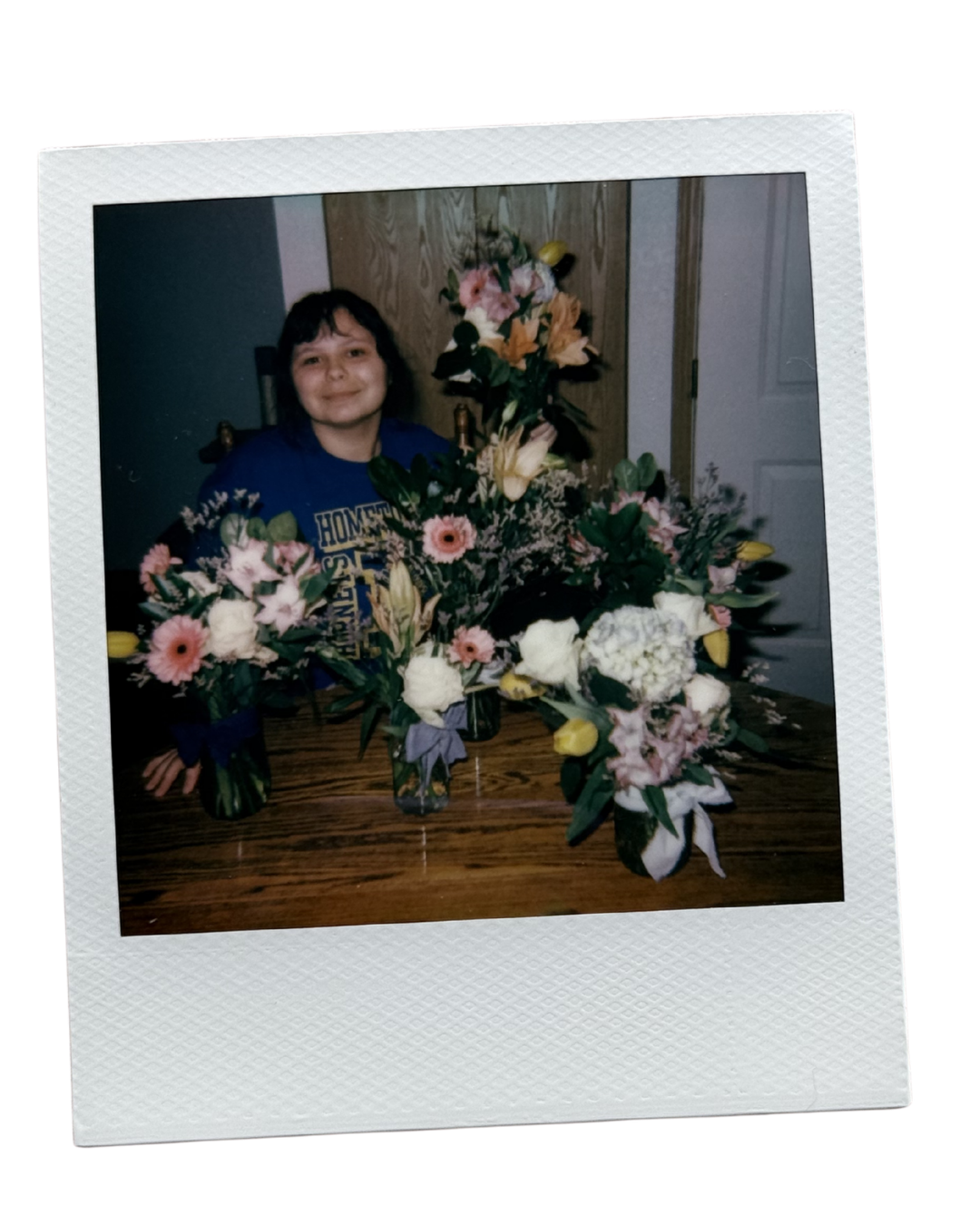 the night before the wedding we bought a bunch of flowers from a grocery store, and we put together these beautiful arrangements