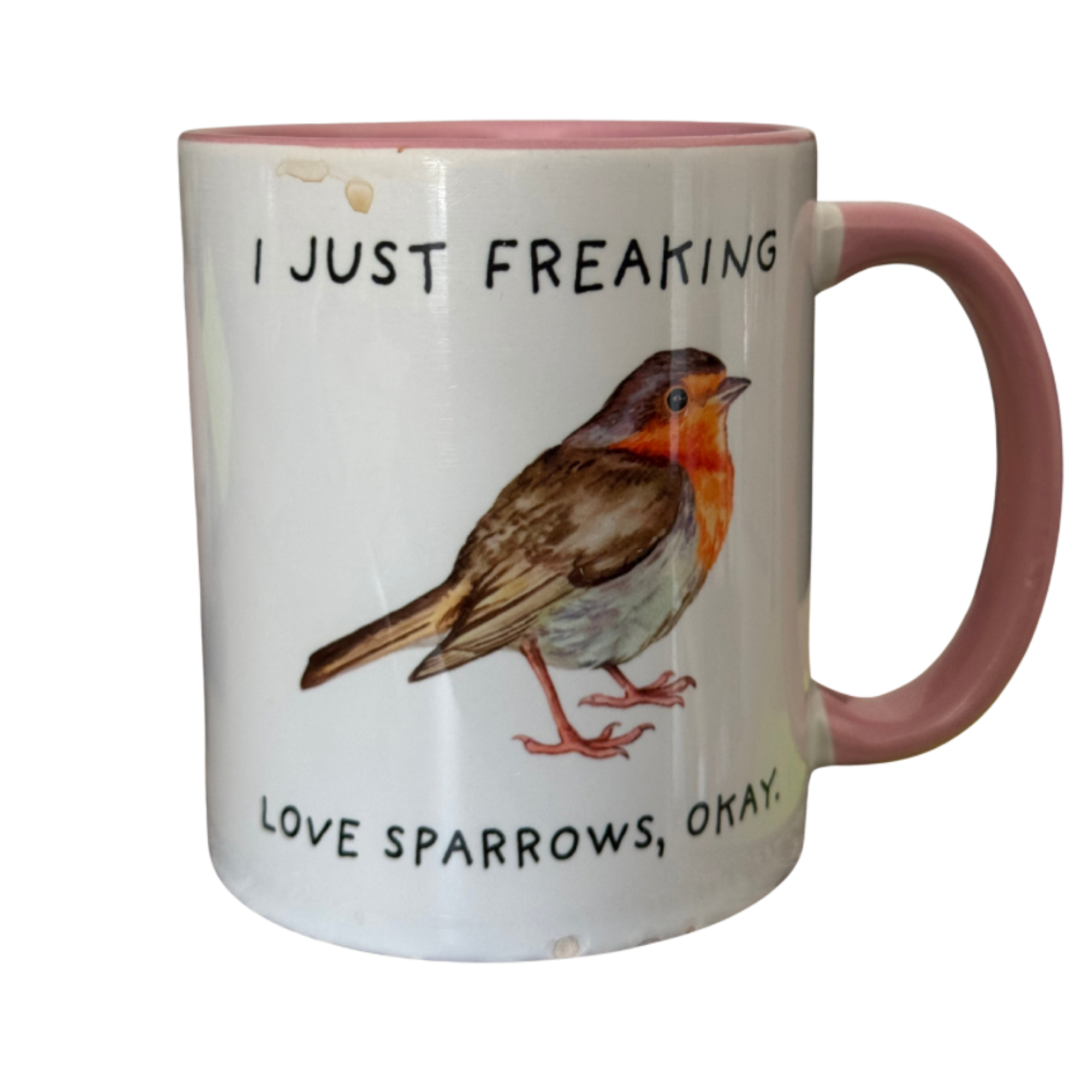 White ceramic mug with pink inside and handle featuring a bird illustration and the text 'I JUST FREAKING LOVE SPARROWS, OKAY'.