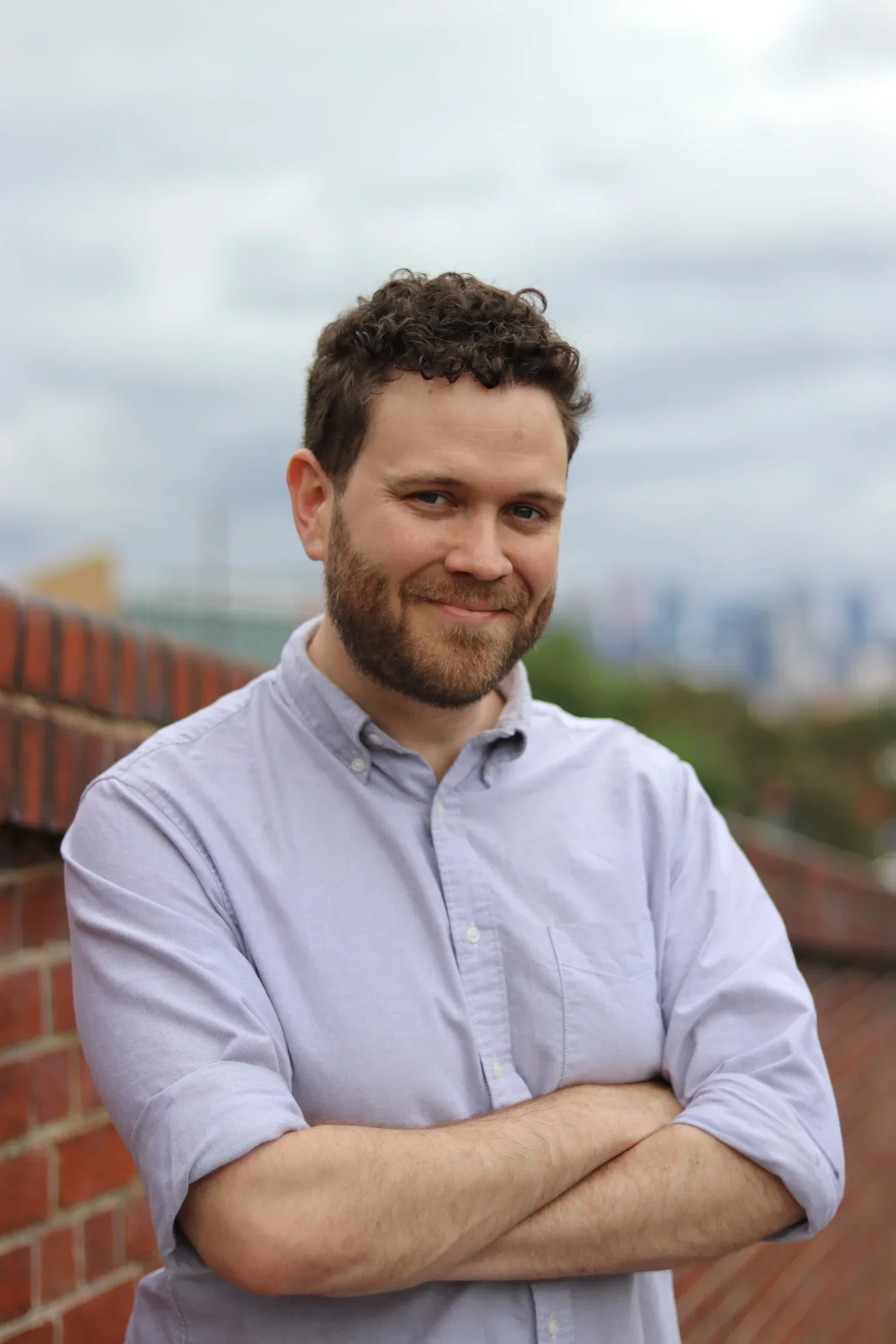 Smiling man - Dylan Alexander - Founder, director and clinical psychologist