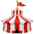 A circus tent with red and white stripes and a yellow flag on top.