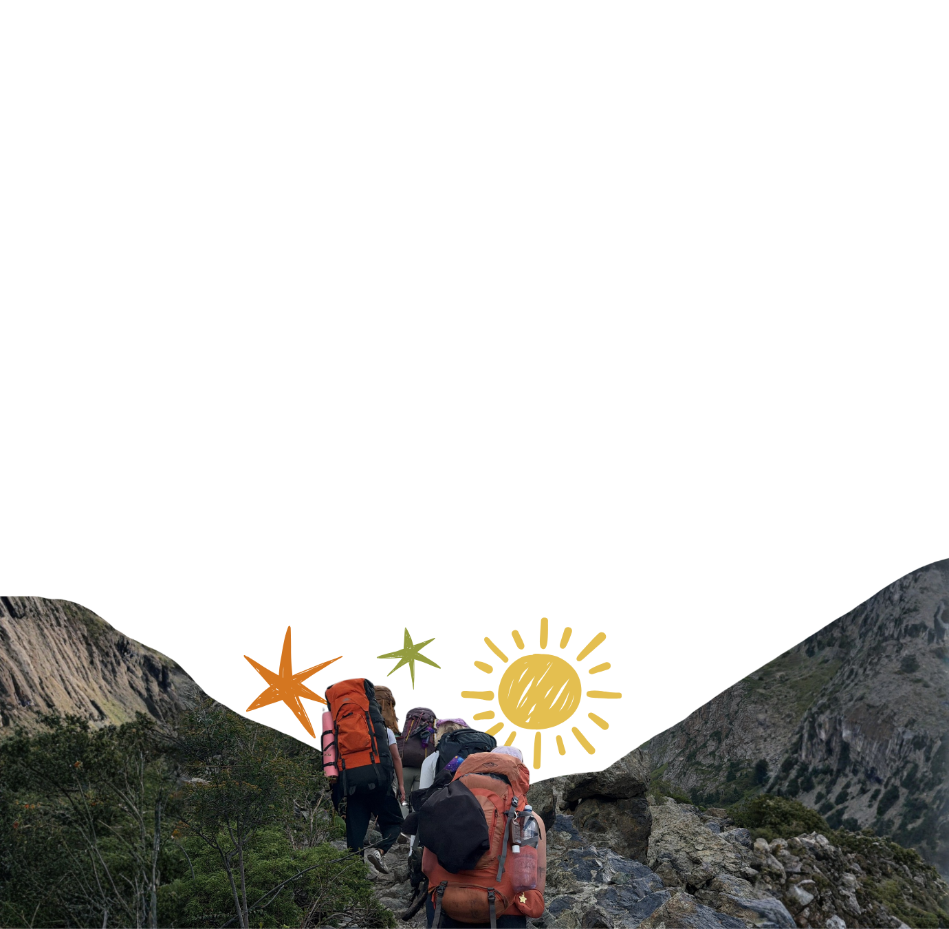 Hikers with backpacks walking on a rocky mountain trail surrounded by green vegetation and steep rocky cliffs.
