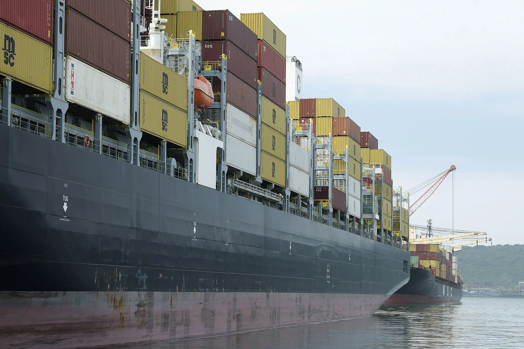 Rows of containers on ship at dock in Durban harbour 