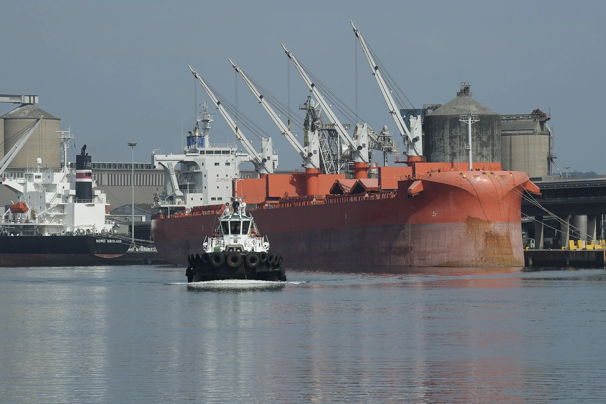 Tugboat on duty to serve the shipping industry in a big African port