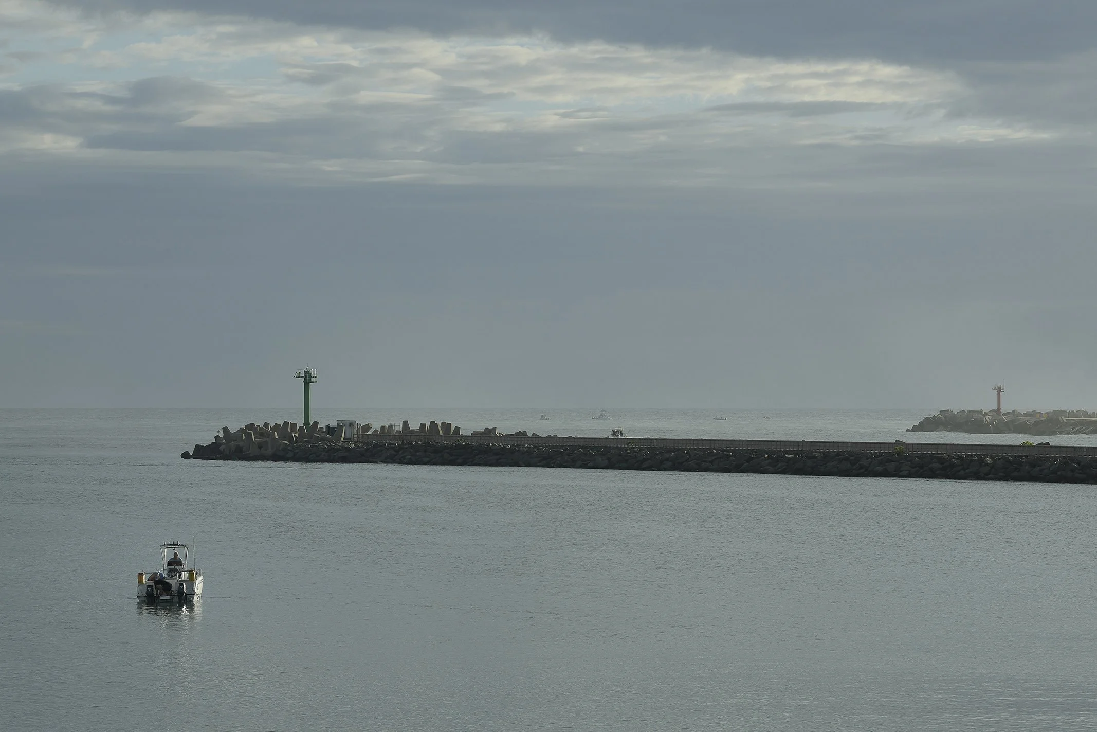 Tranquil scene of harbour entrance on calm morning composed for a background image
