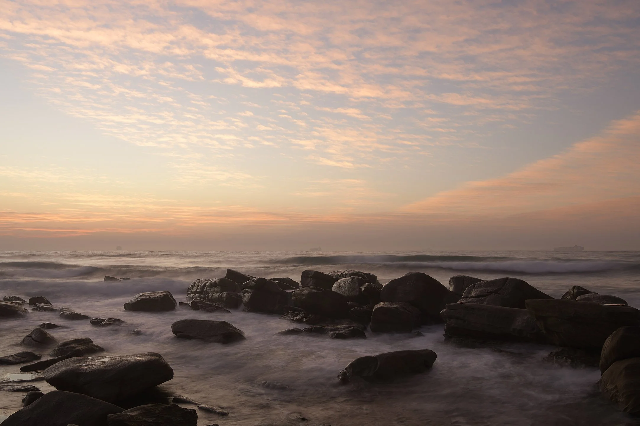 Where the sky and the ocean meet, atmospheric shot of motion blur at daybreak for your calendar project