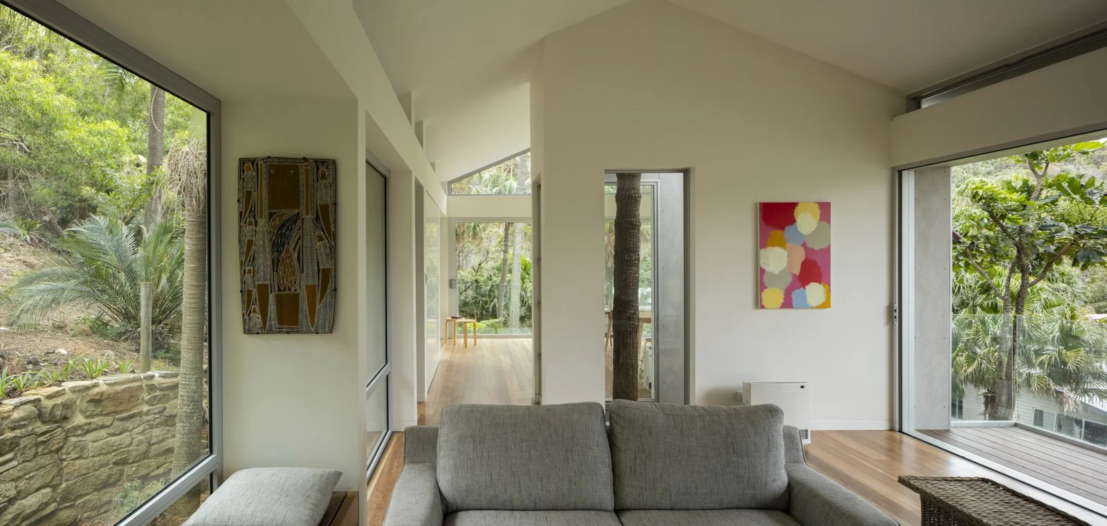 Light-filled living space with expansive glazing and bushland views.jpg