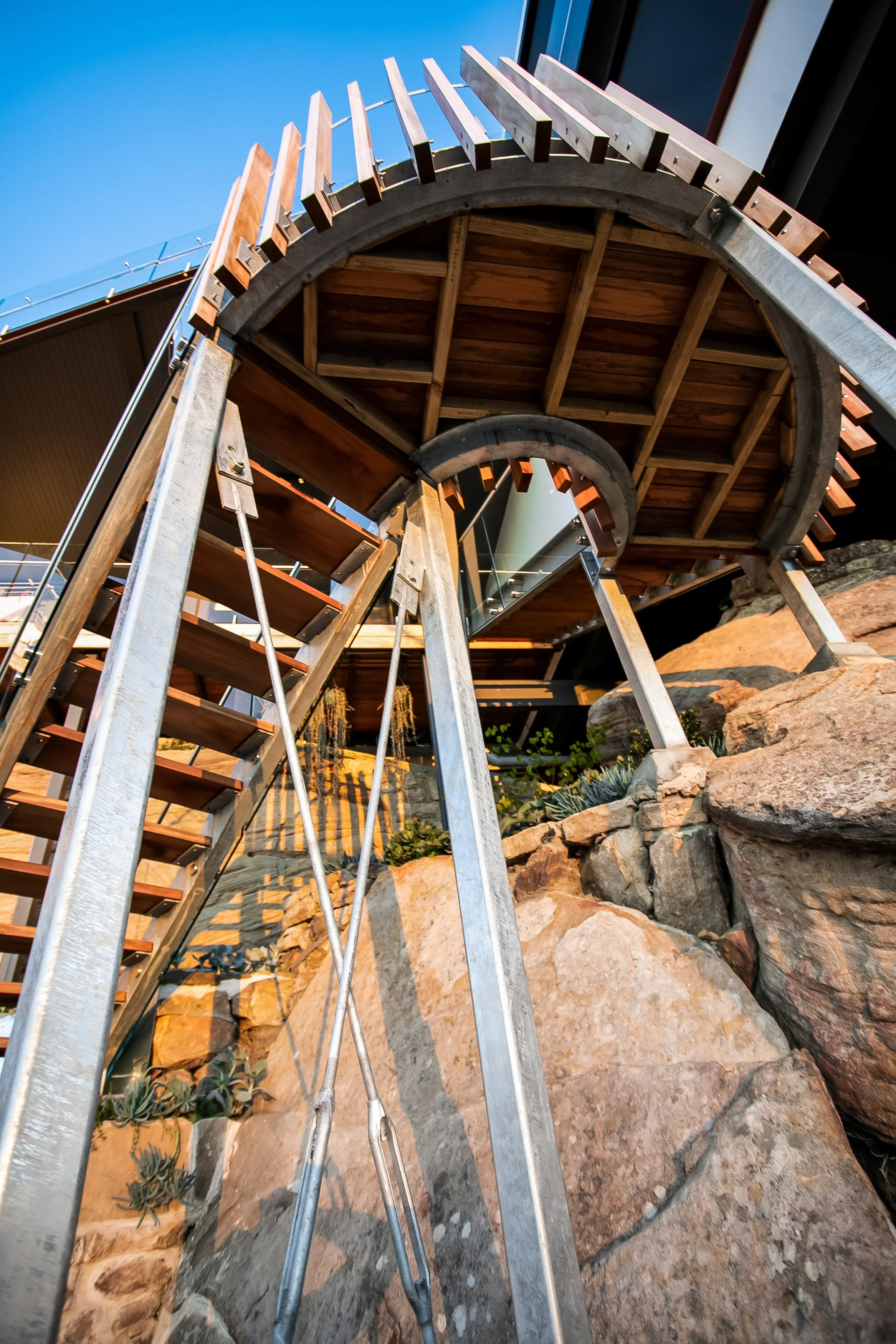 Intricate staircase geometry executed through meticulous craftsmanship.jpg