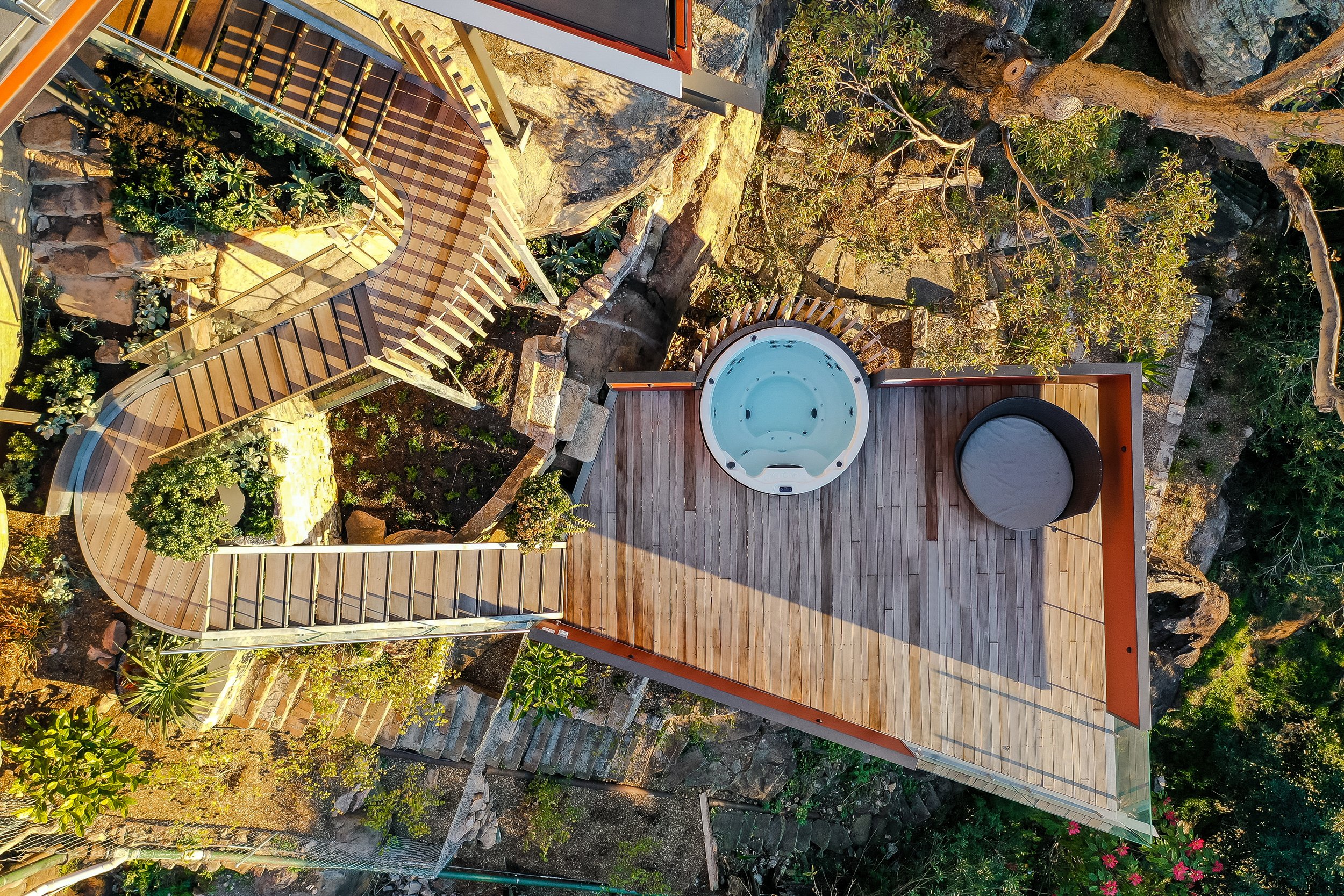Expansive timber viewing deck extending towards the cliff edge.jpg