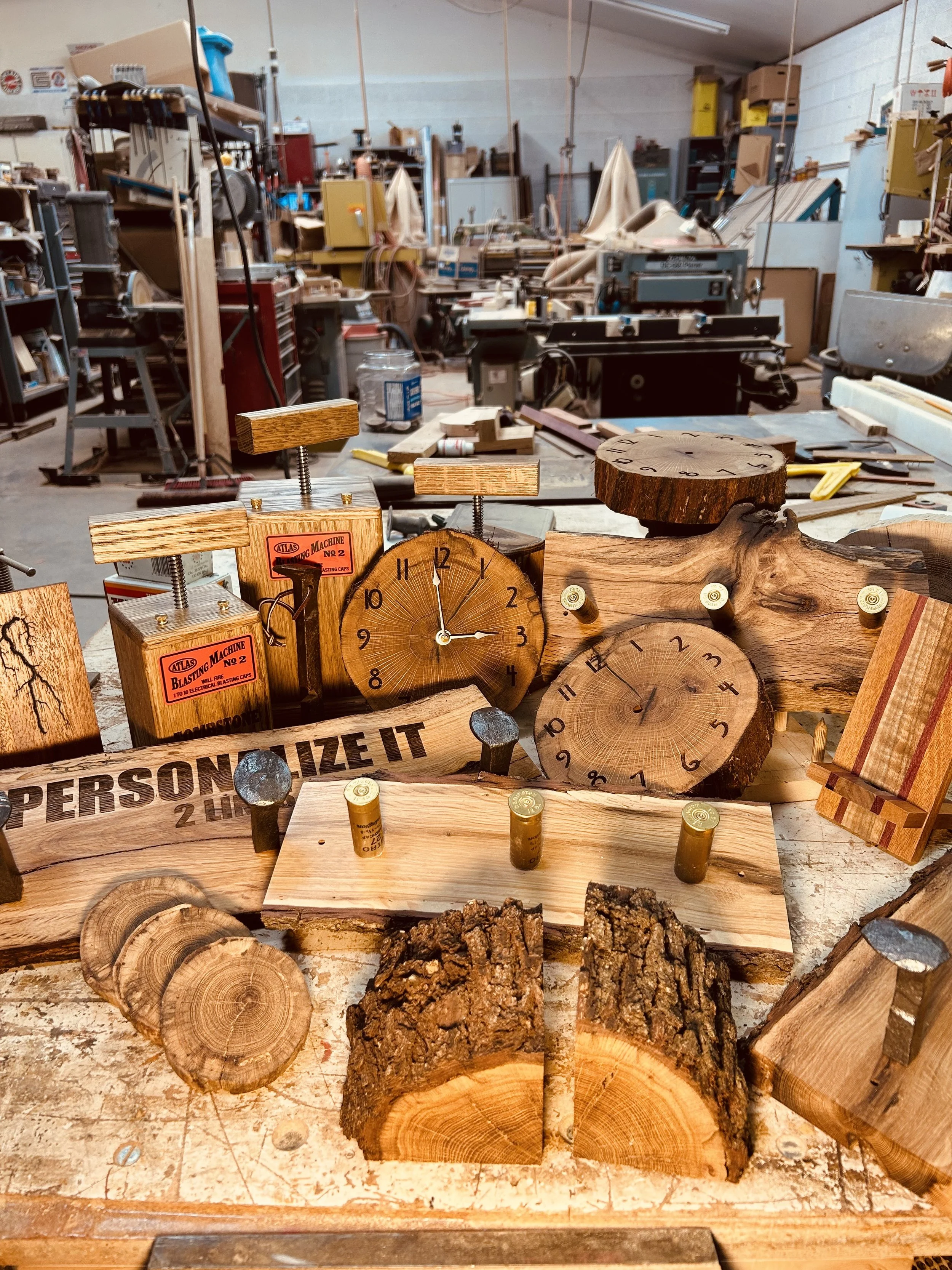 Under The Pines Designs and Grand Canyon Lodge woodworking shop featuring industrial saws, lathes, tools, and ive edge gamble oak, red oak, mahogany, walnut, cherry handcrafted rustic wood southwest forest products