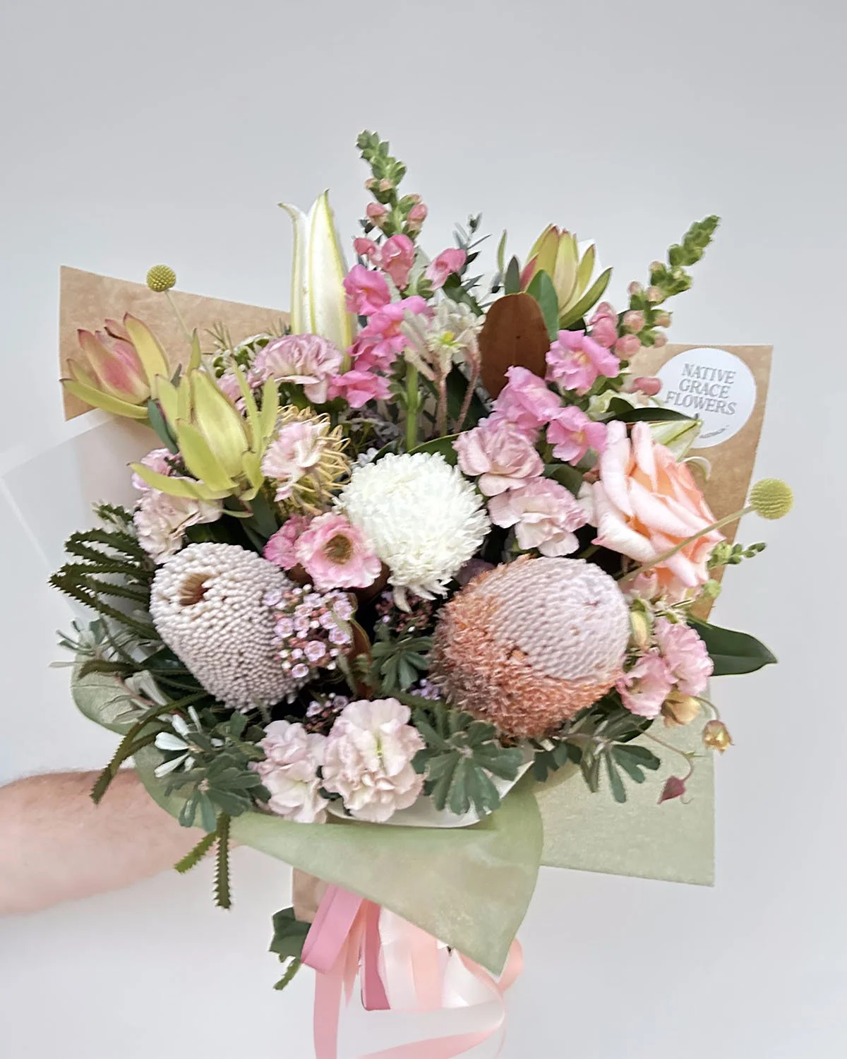 graceful-gather-medium-wrapped-bouquet-GracefulSignatureWrapped.jpg