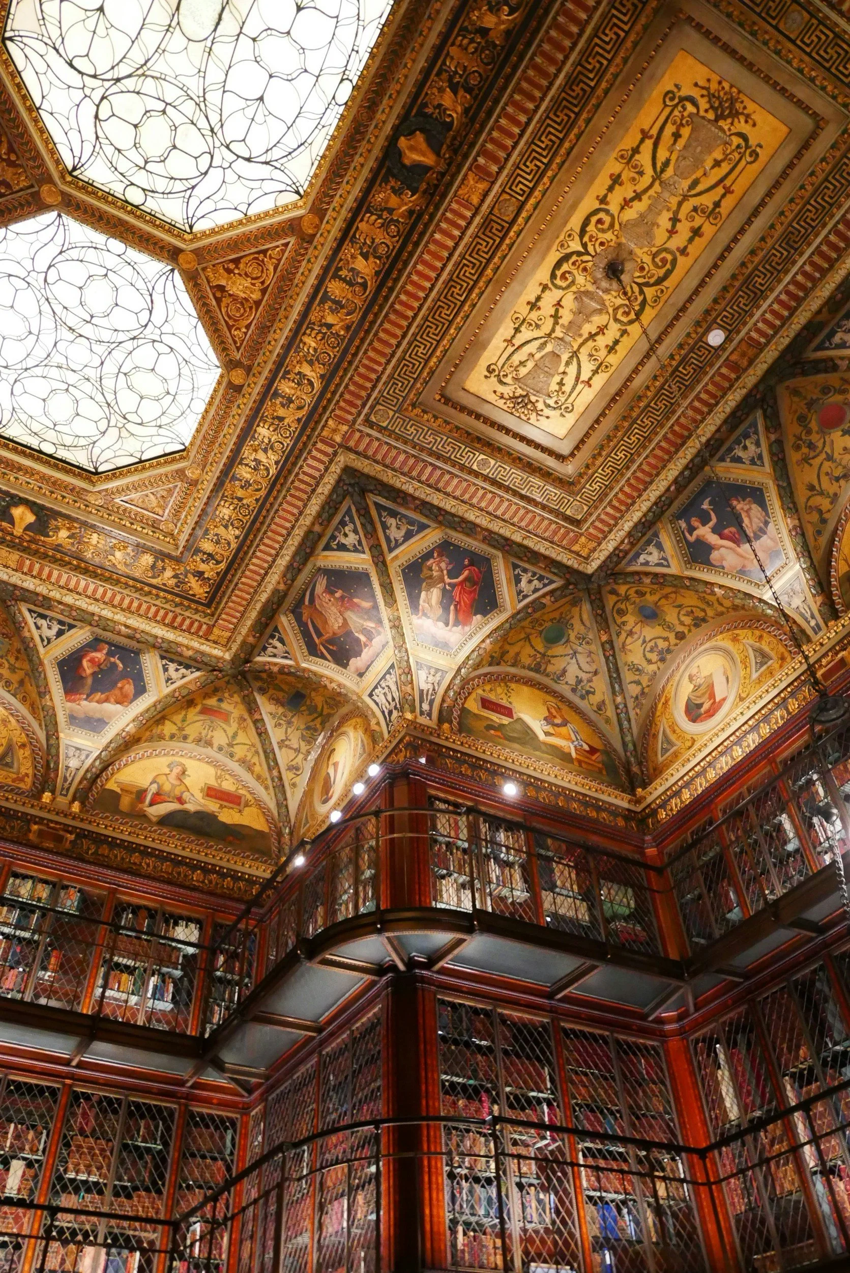 Historical ceiling with gold detailed and painted decorative motifs.