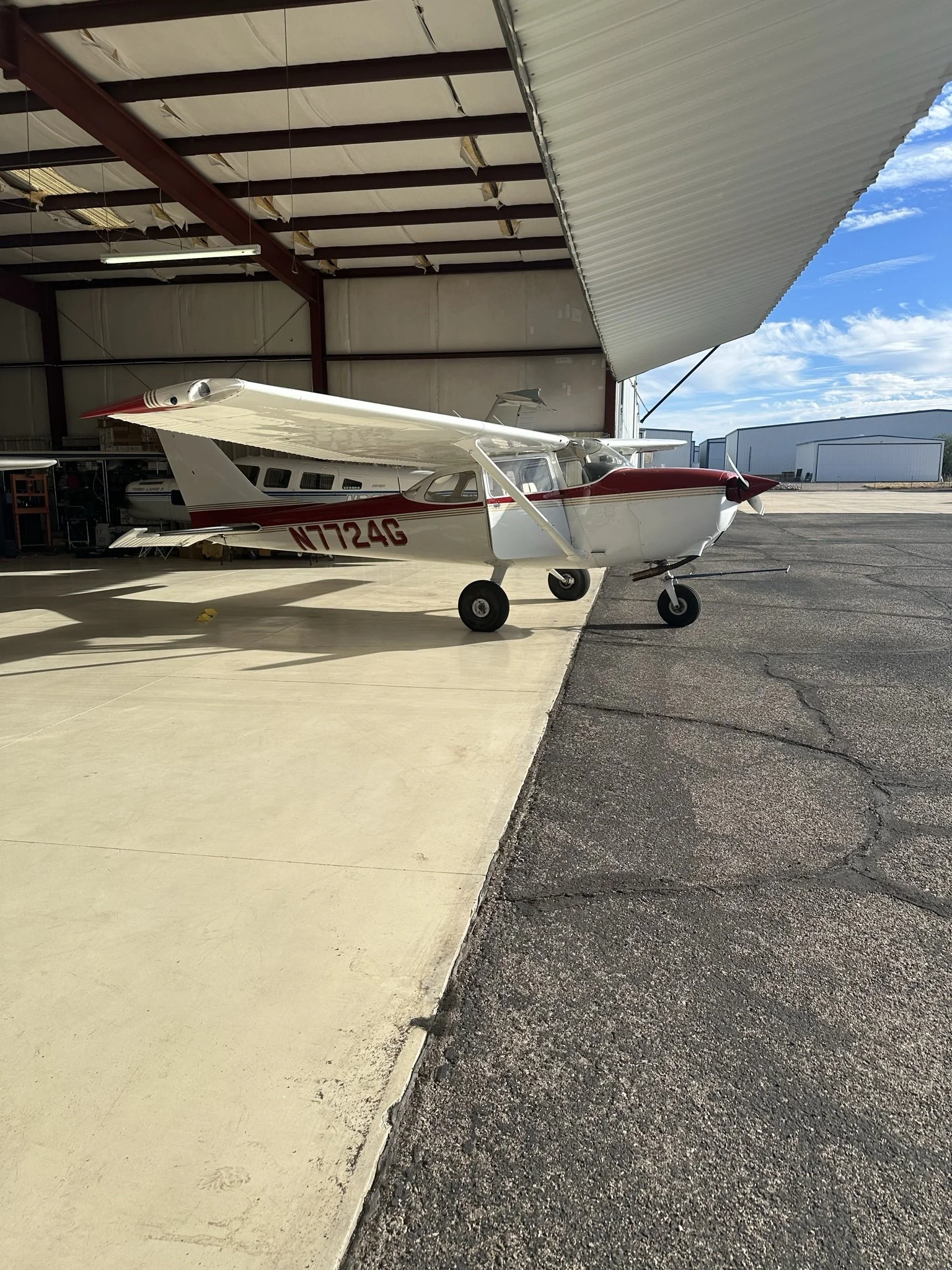 Cessna 172L N7724G in its hangar at Ryan Airfield, Tucson