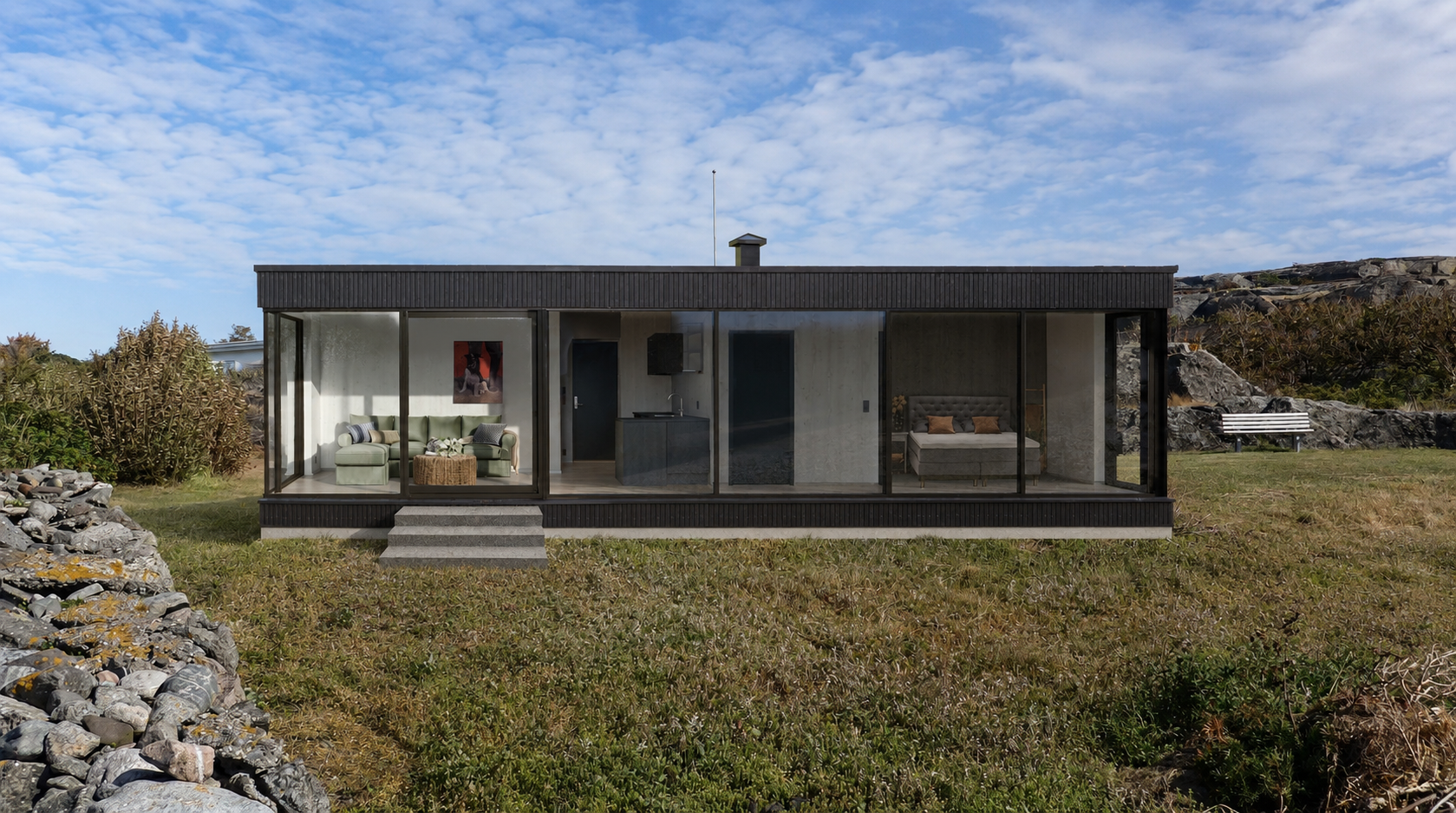 Modern tiny house with glass walls, situated outdoors on a grassy area with rocks and bushes, under a partly cloudy sky.