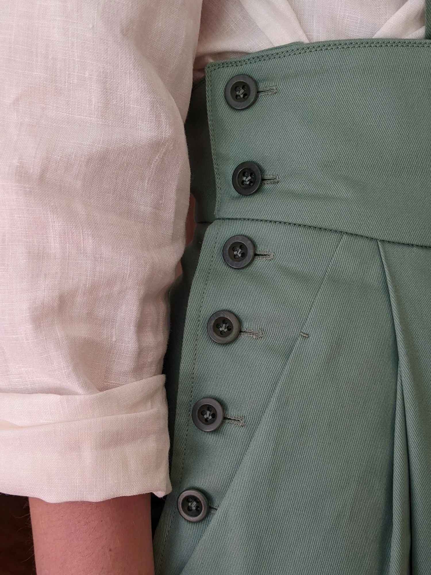 Hand sewn buttonholes -  zampa di gallina