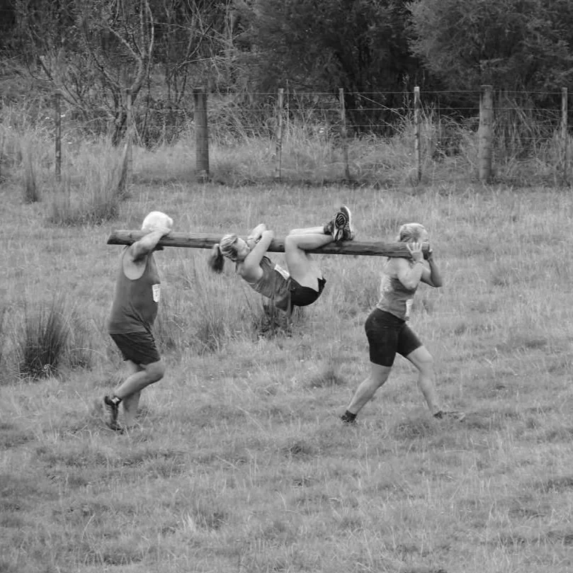 Rise Up Fitness members taking part in a team fitness event