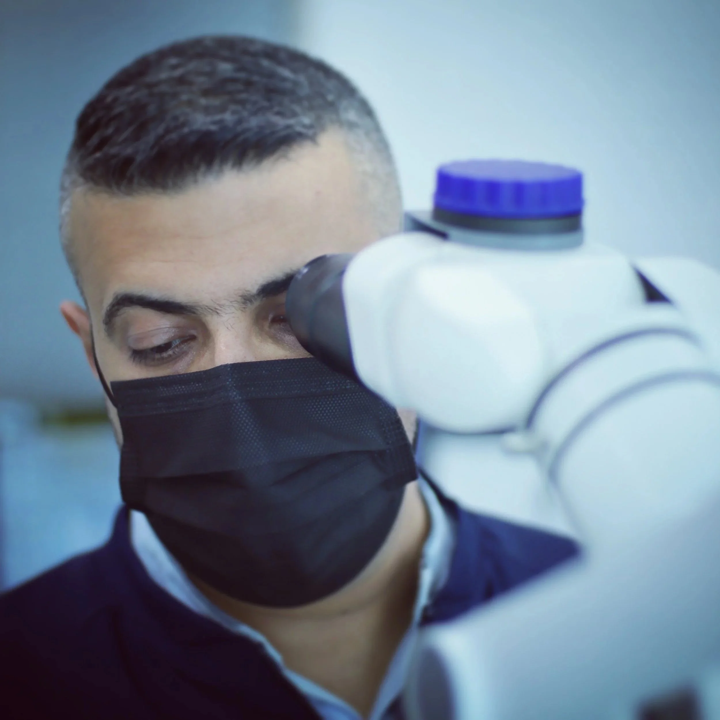 Clinician using a dental operating microscope