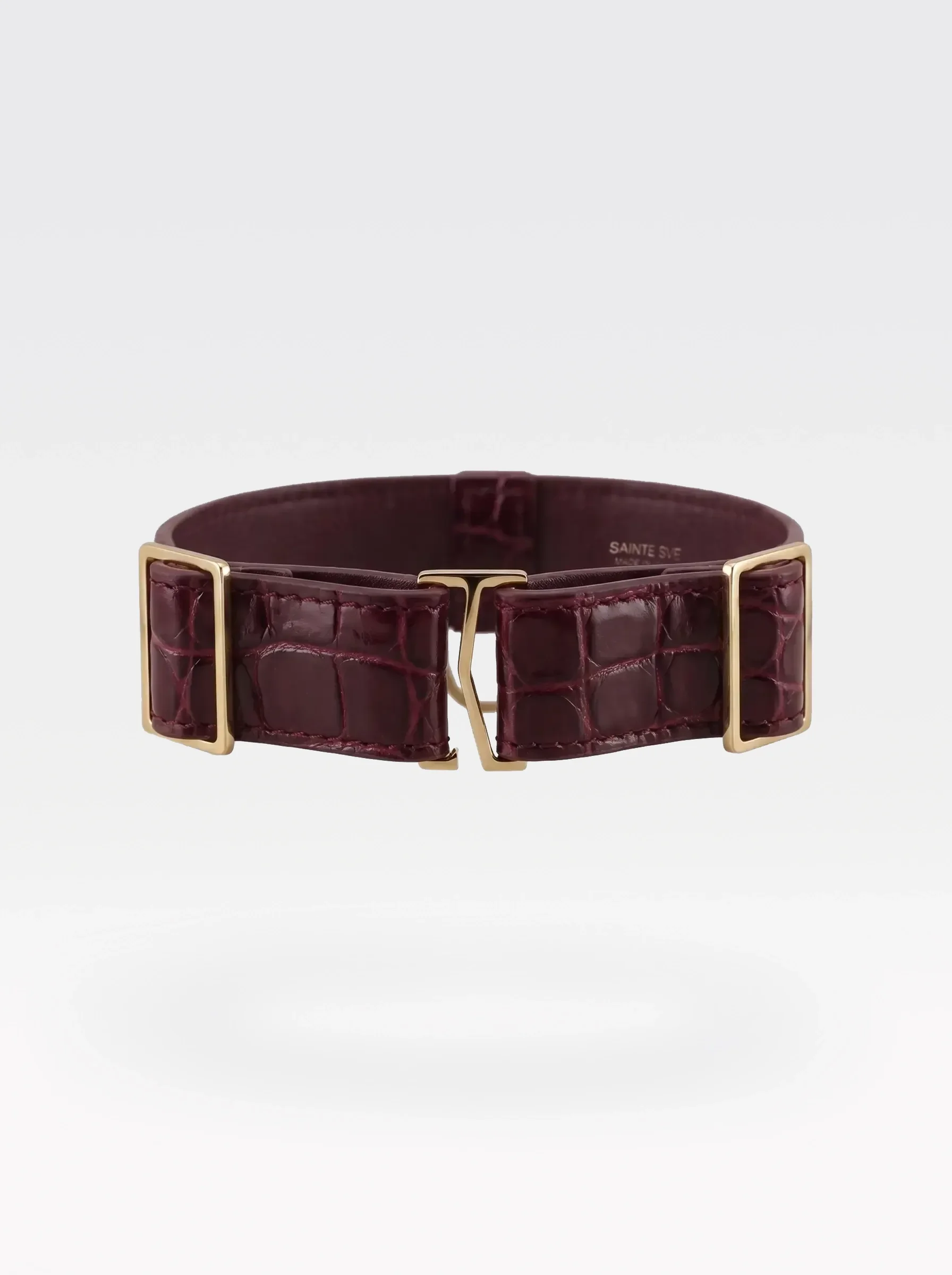 Sainte Sve Choker Croc in burgundy crocodile-embossed lambskin with a 24K gold-plated brass slider at the closure, back view