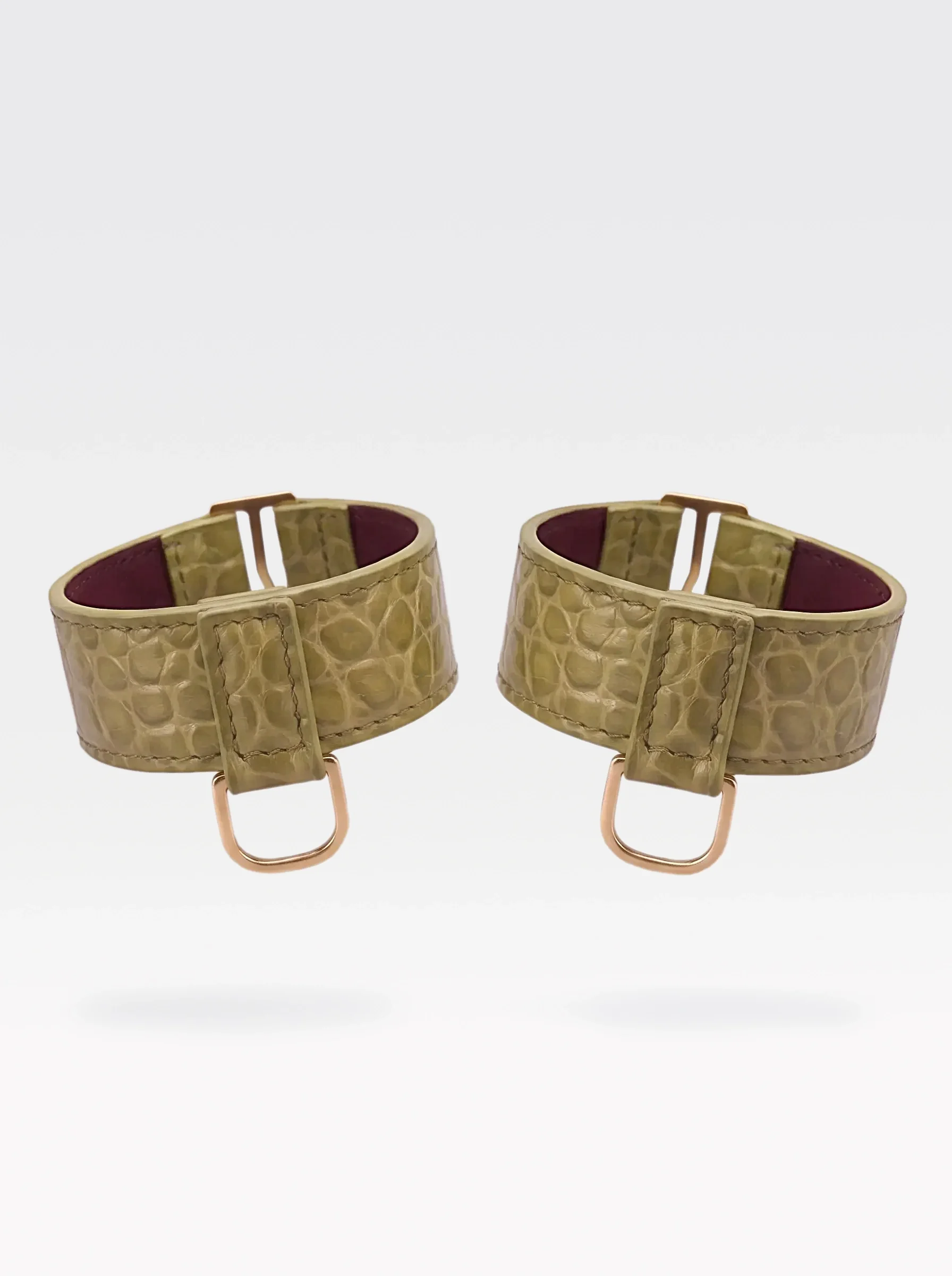 Sainte Sve Wrist Bracelets Croc in pistachio crocodile-embossed lambskin with burgundy nappa lambskin lining and 24K gold-plated brass D rings, front view