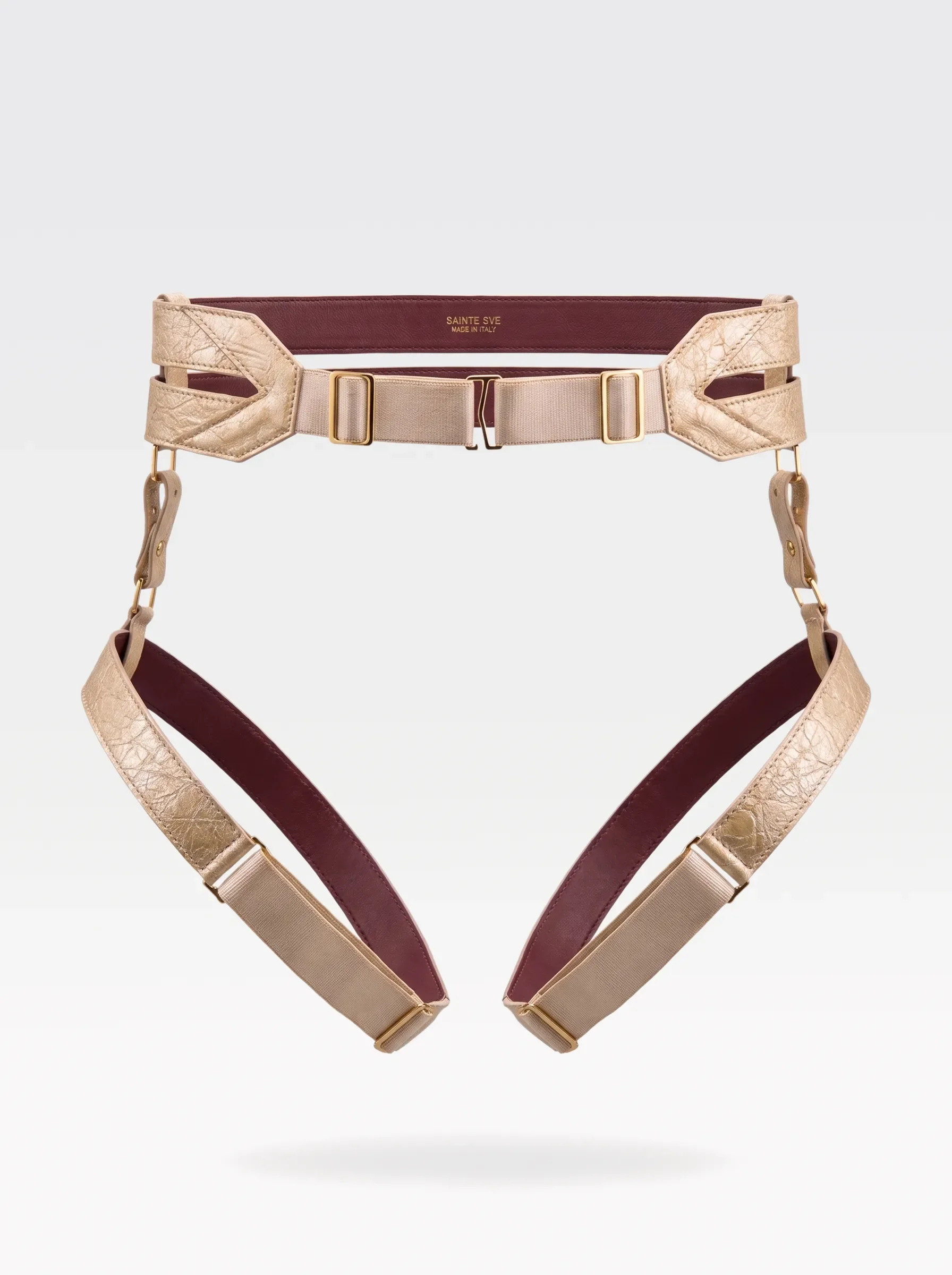 Sainte Sve Belt Plus Laminated in gold laminated lambskin with burgundy nappa lambskin lining and 24K gold-plated brass hardware, back view
