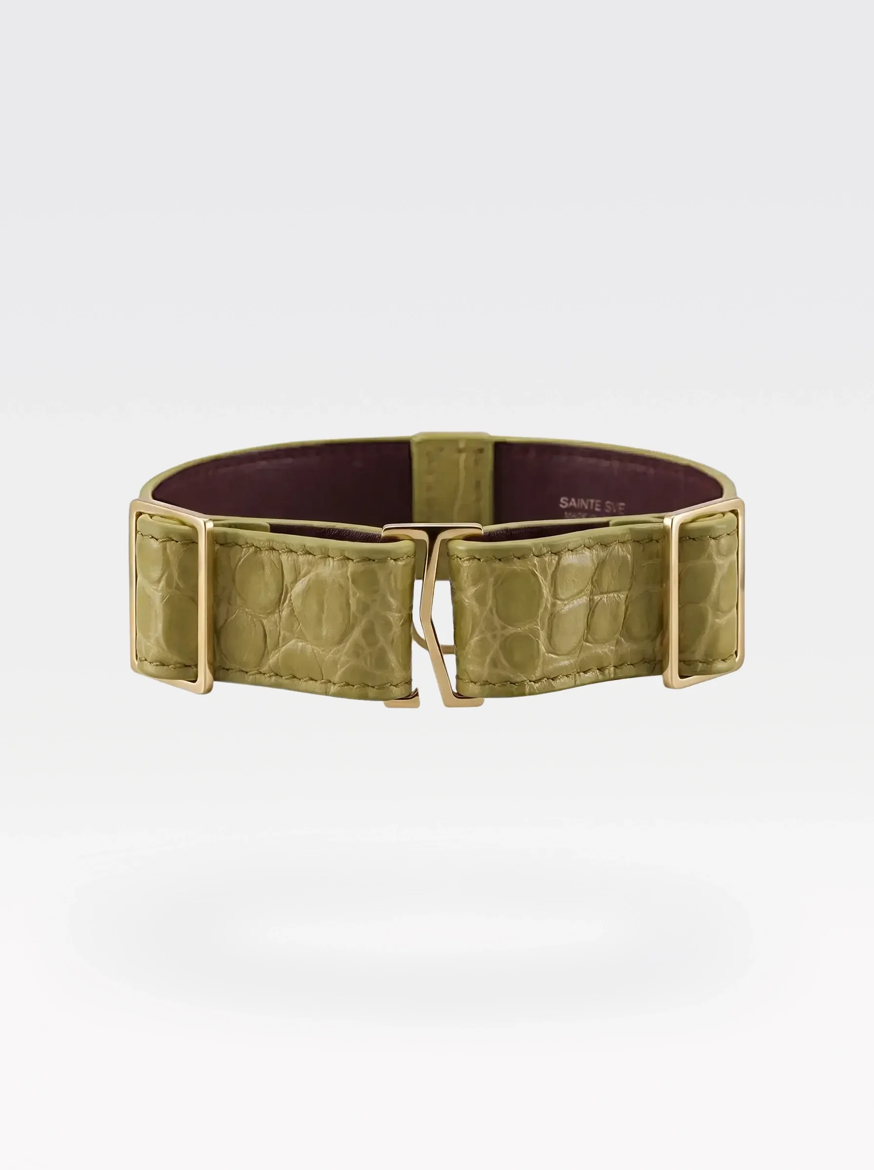 Sainte Sve Choker Croc in pistachio crocodile-embossed lambskin with a 24K gold-plated brass slider at the closure, back view