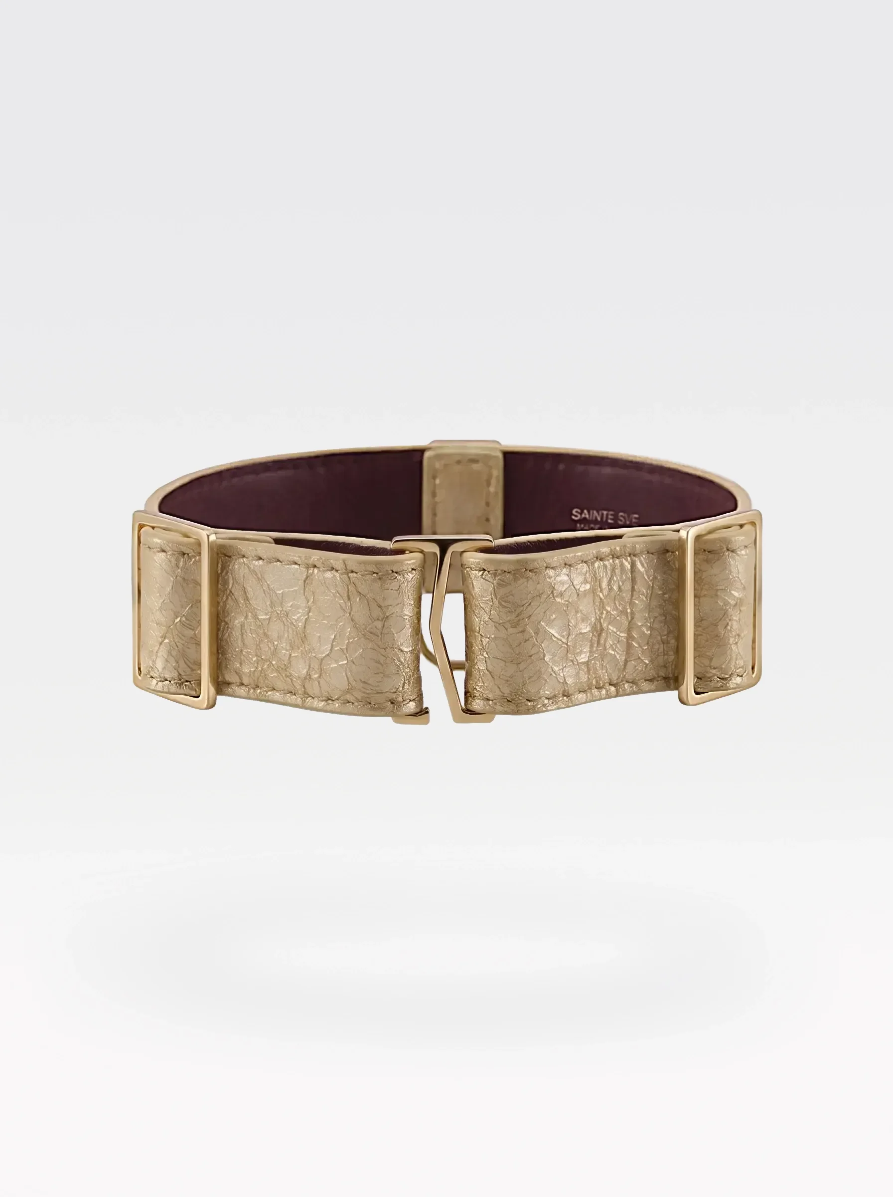 Sainte Sve Choker Laminated in gold laminated lambskin with a 24K gold-plated brass slider at the closure, back view