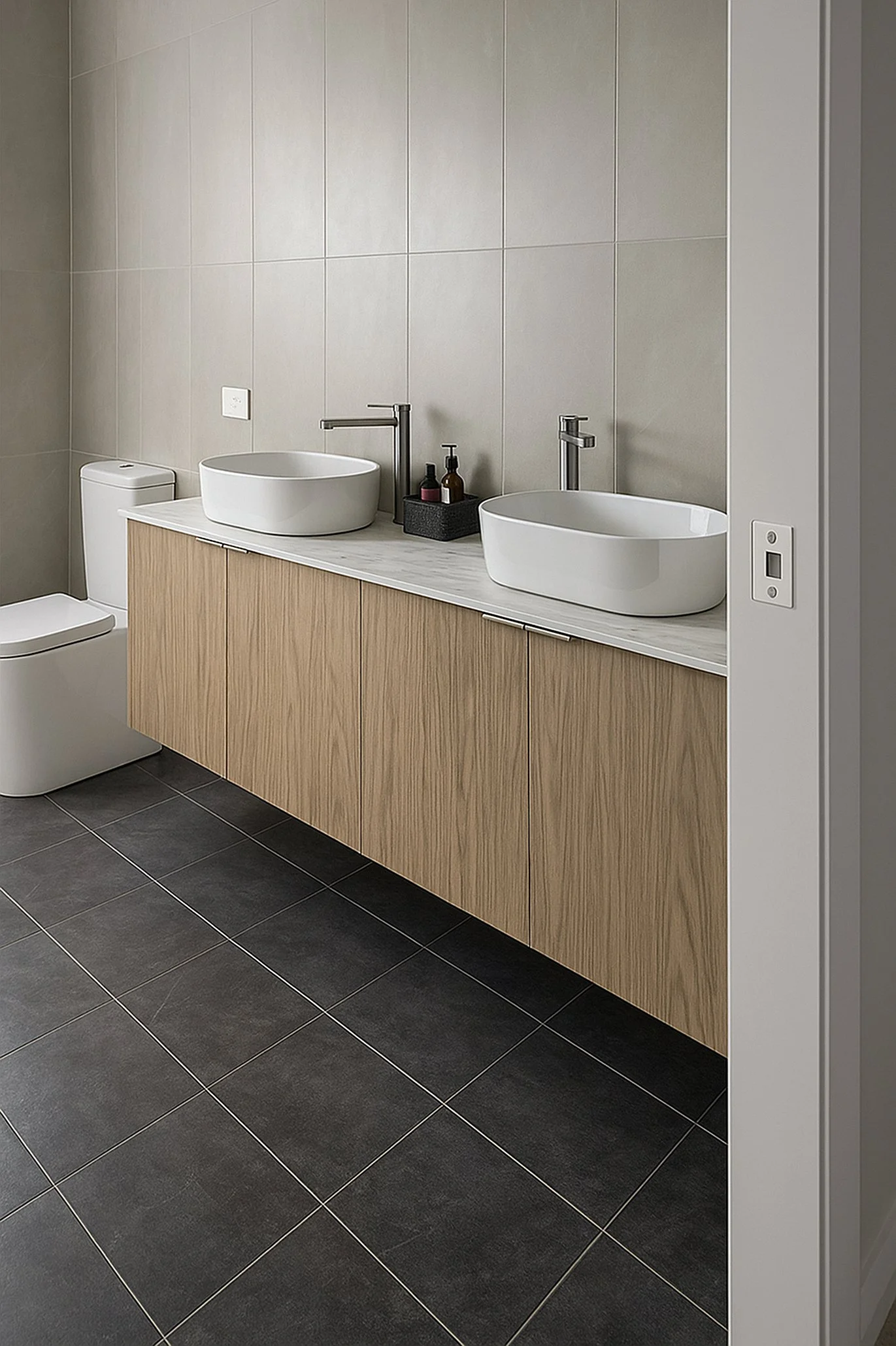 Custom timber bathroom vanity with twin vessel basins and stone benchtop.